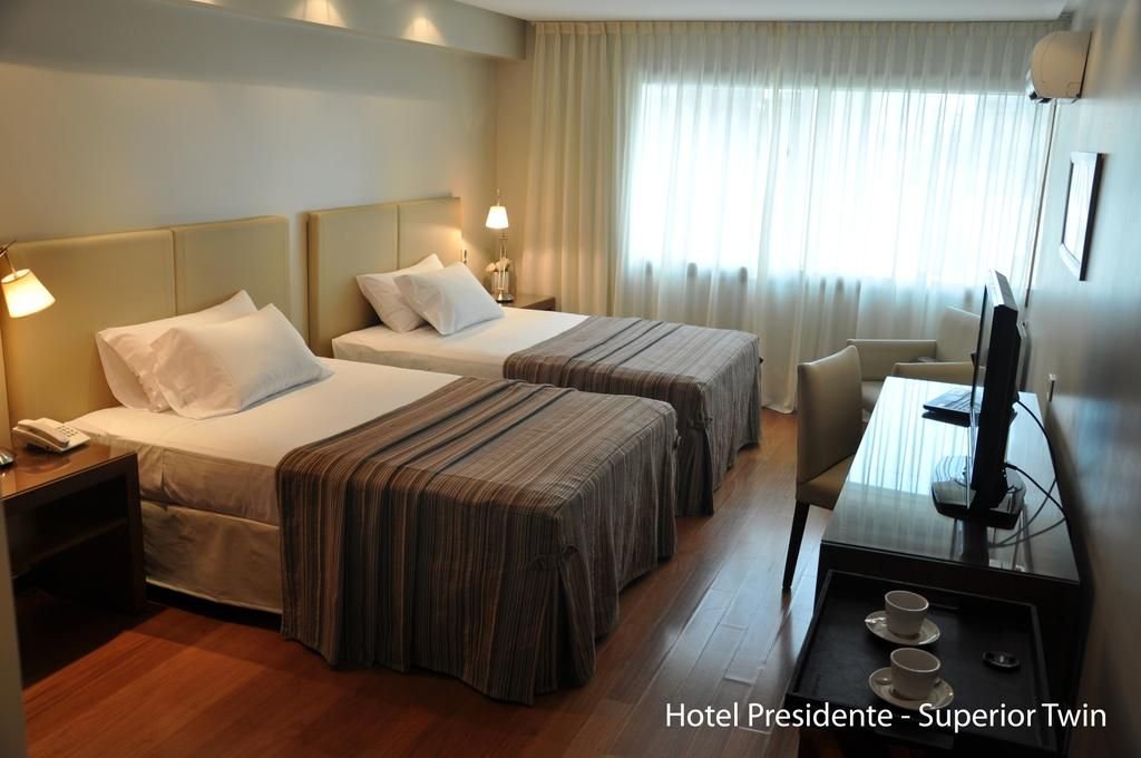 HOTEL PRESIDENTE ROSARIO-guestroom-Concept two single beds.jpg