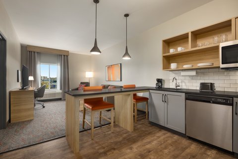 Settle in with the comforts of home and room to unwind.