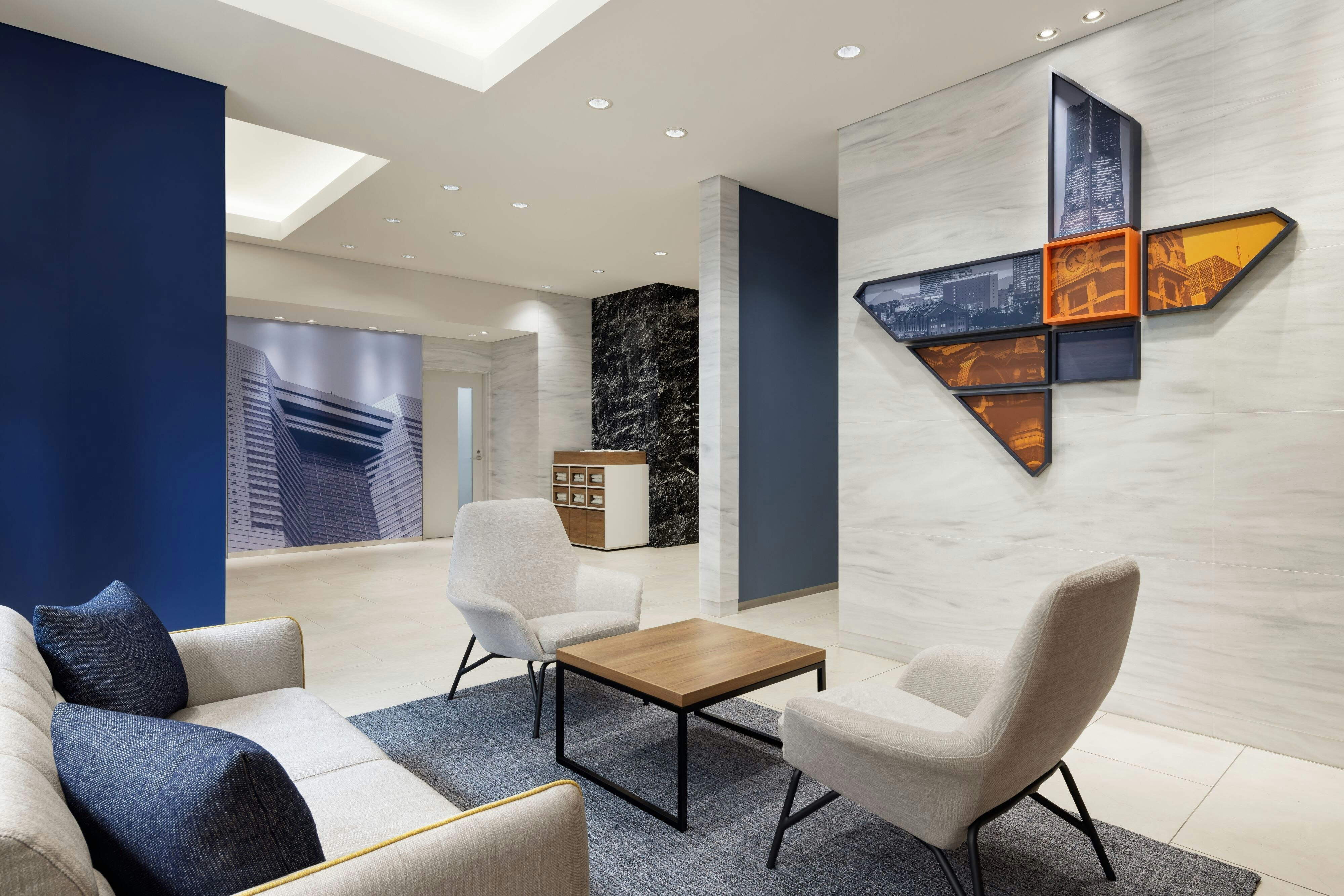 Four Points Flex by Sheraton Yokohama West-guestroom-Welcoming Entrance sofa.jpg