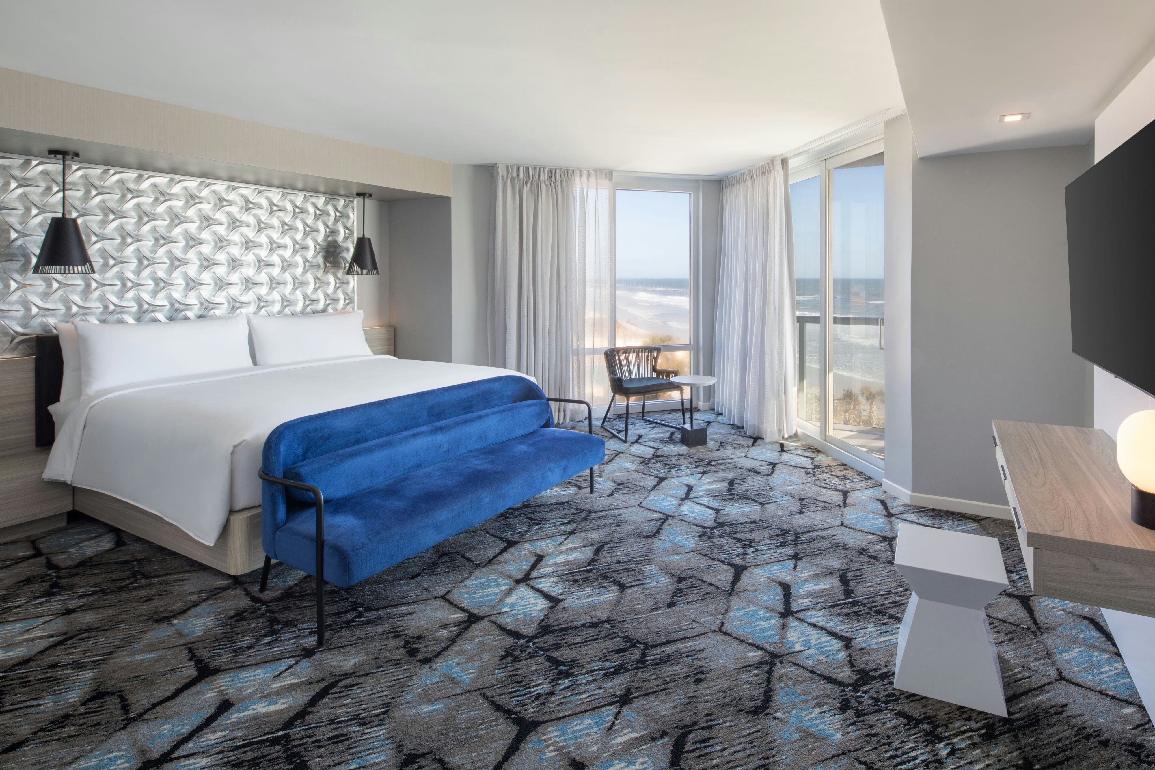 Renaissance Daytona Beach Oceanfront Hotel-guestroom-Oceanfront Suite Bedroom.jpg