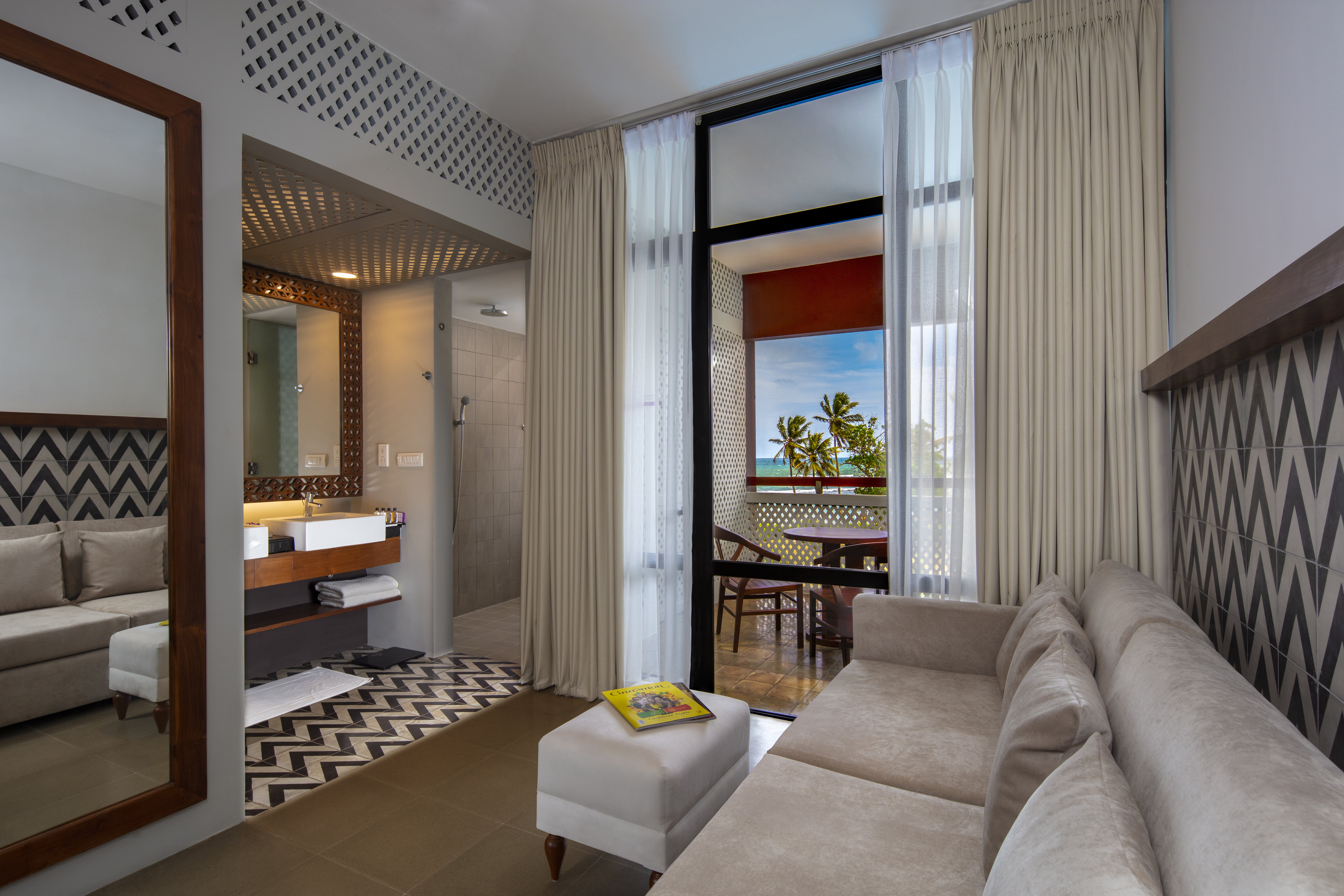 CINNAMON BEY BERUWALA-guestroom-Deluxe Room Living Area.jpg