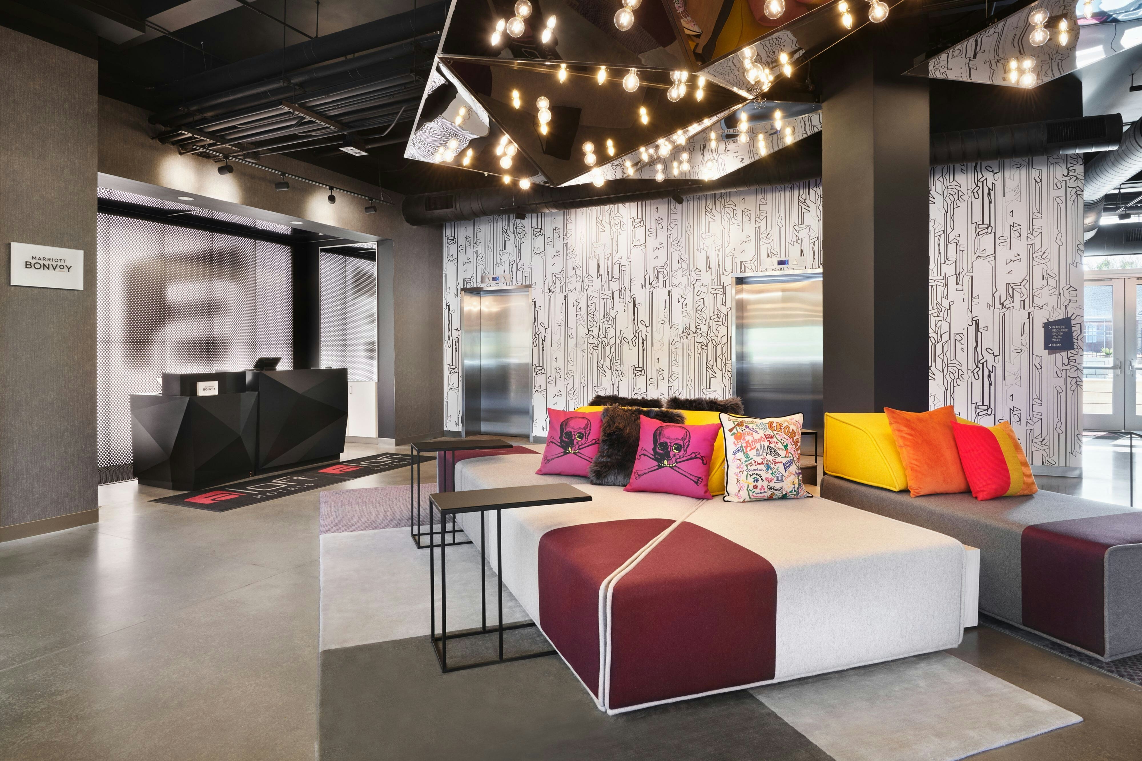 Aloft Atlanta Perimeter Center-guestroom-Selfie Sofa.jpg