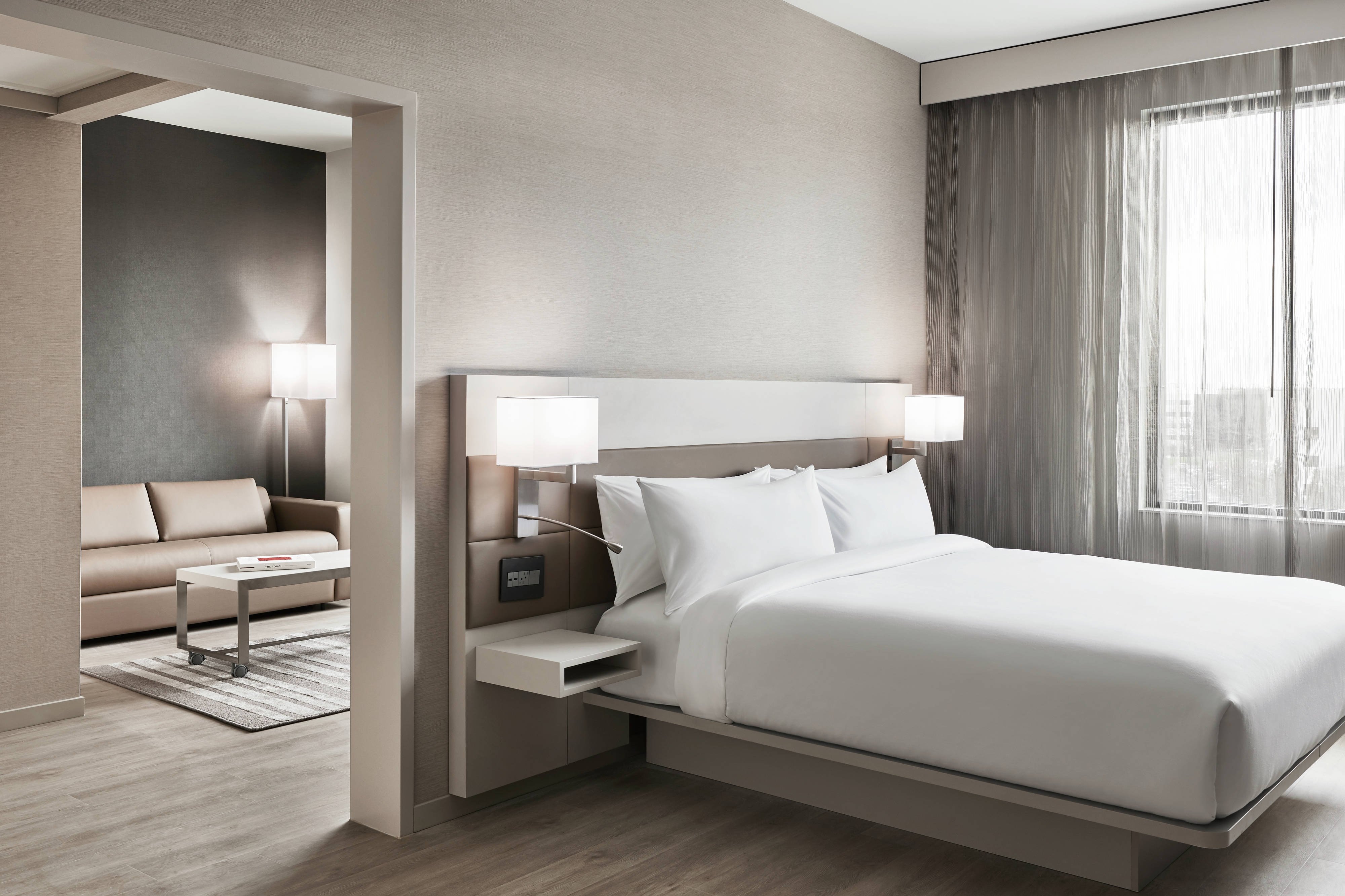 AC Hotels by Marriott Charlotte SouthPark-guestroom-King Suite.jpg