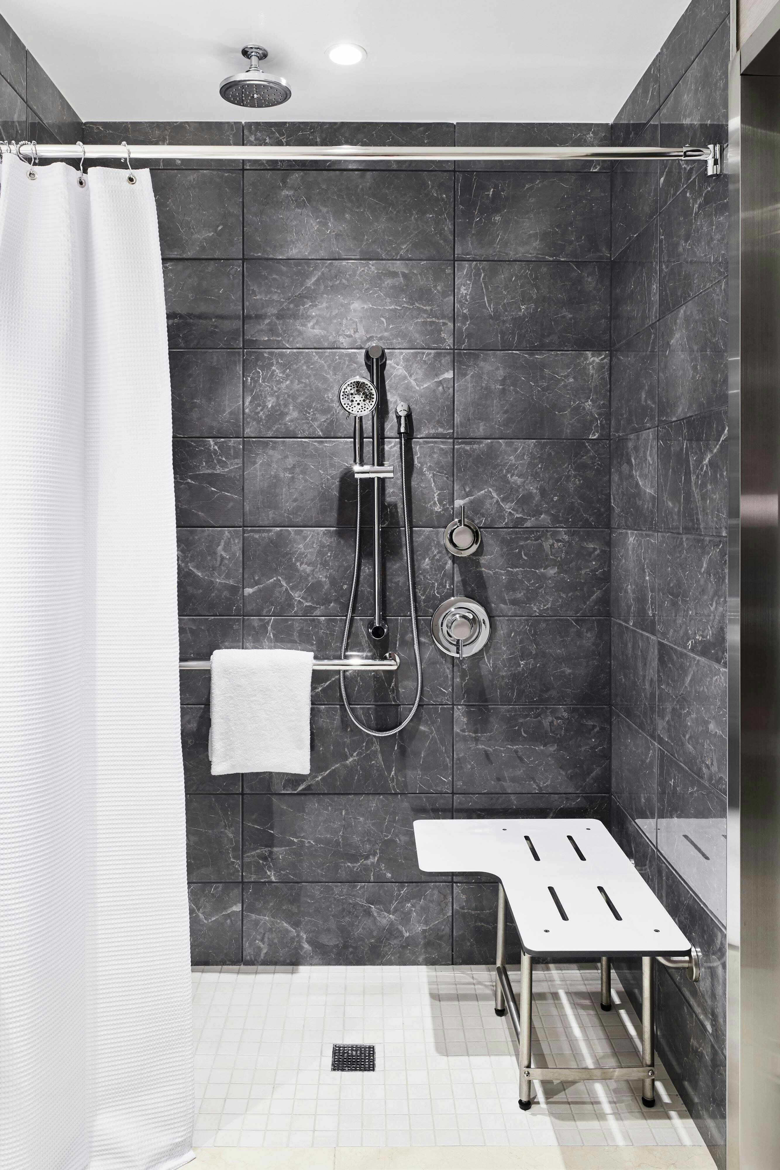 AC Hotels by Marriott Charlotte SouthPark-guestroom-Accessible Bathroom - Roll-In Shower.jpg