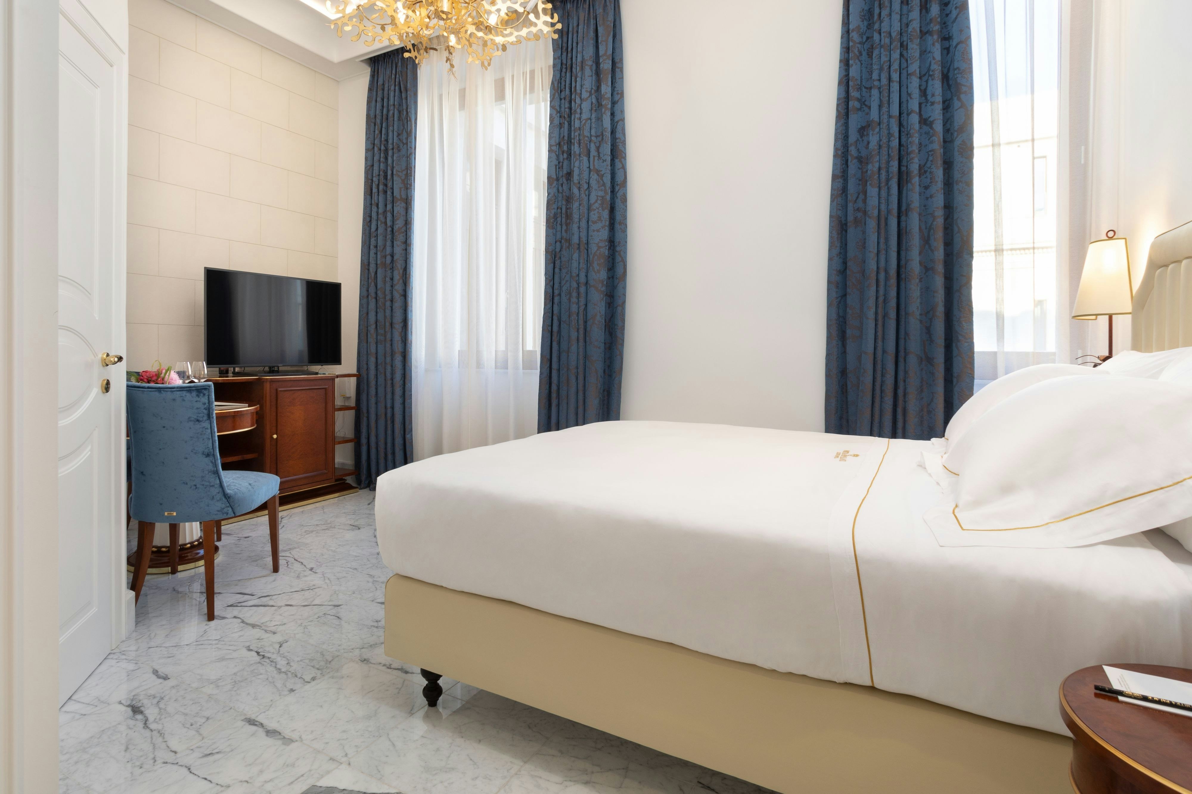 Ortea Palace Hotel Sicily Autograph Collection-guestroom-24sqm bedroom courtyard.jpg
