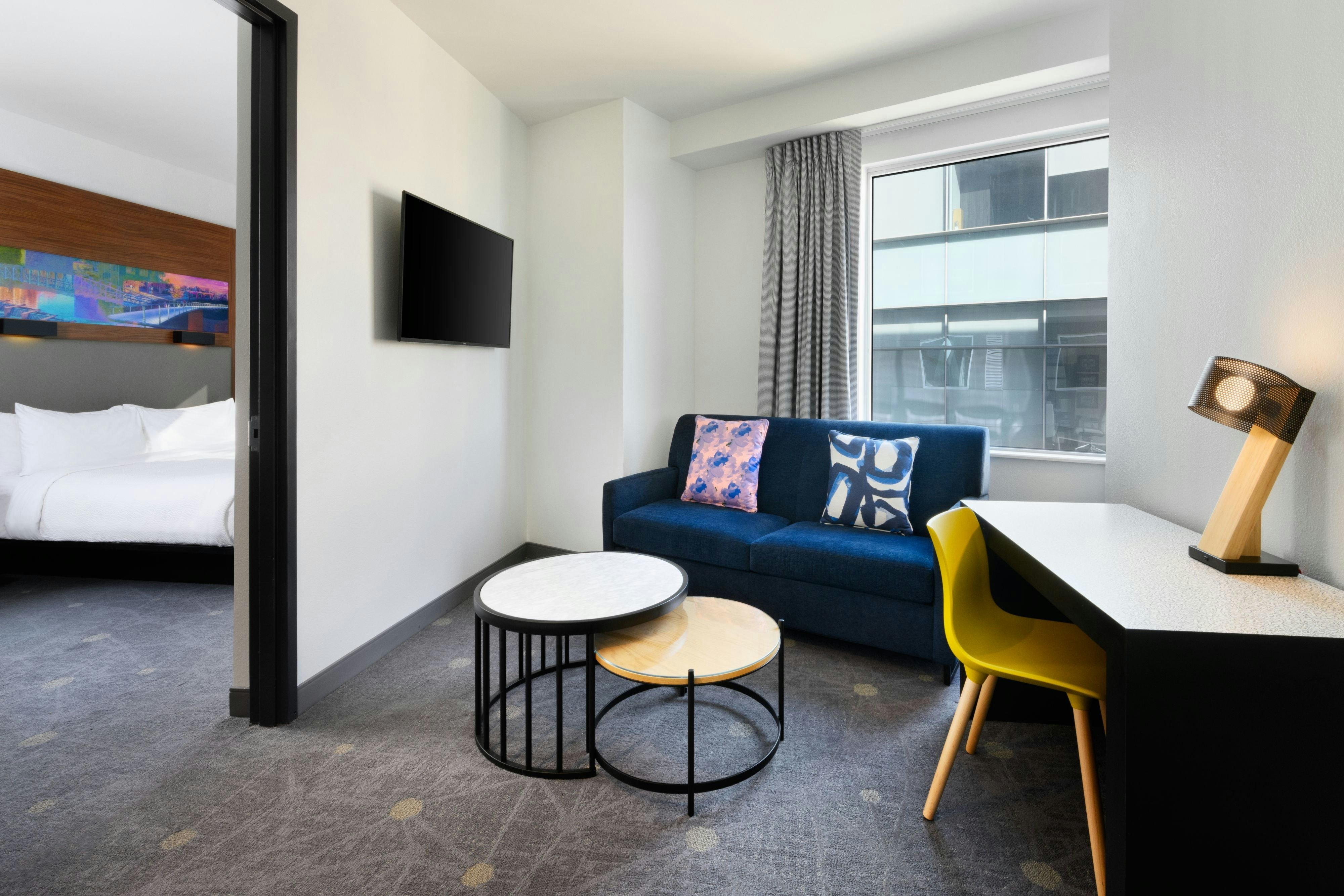 Aloft Greenville Downtown-guestroom-Smaller Suite Living Area.jpg