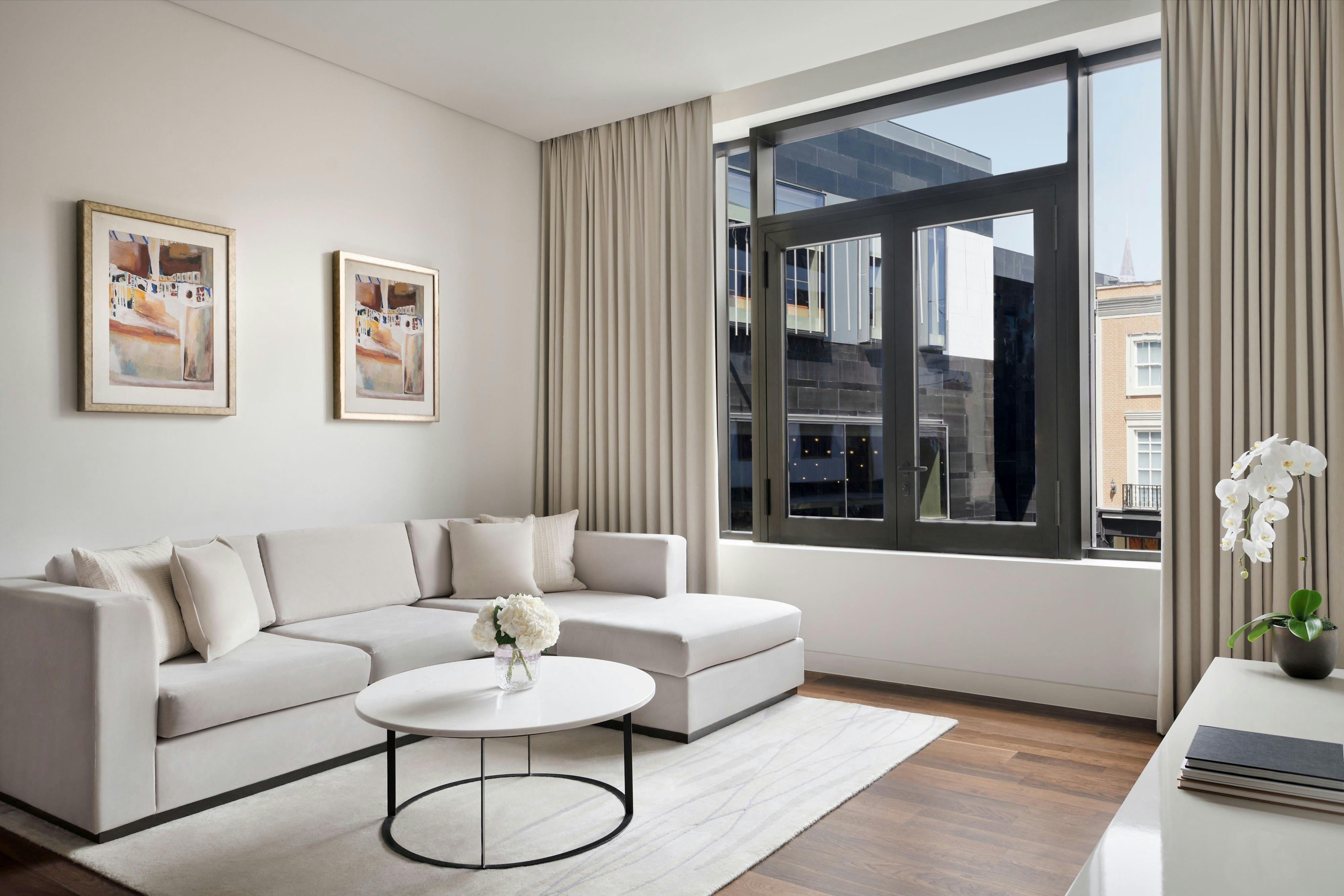 La Ville Hotel and Suites CITY WALK Dubai Autograph Collection-guestroom-Junior Suite Living Room.jpg