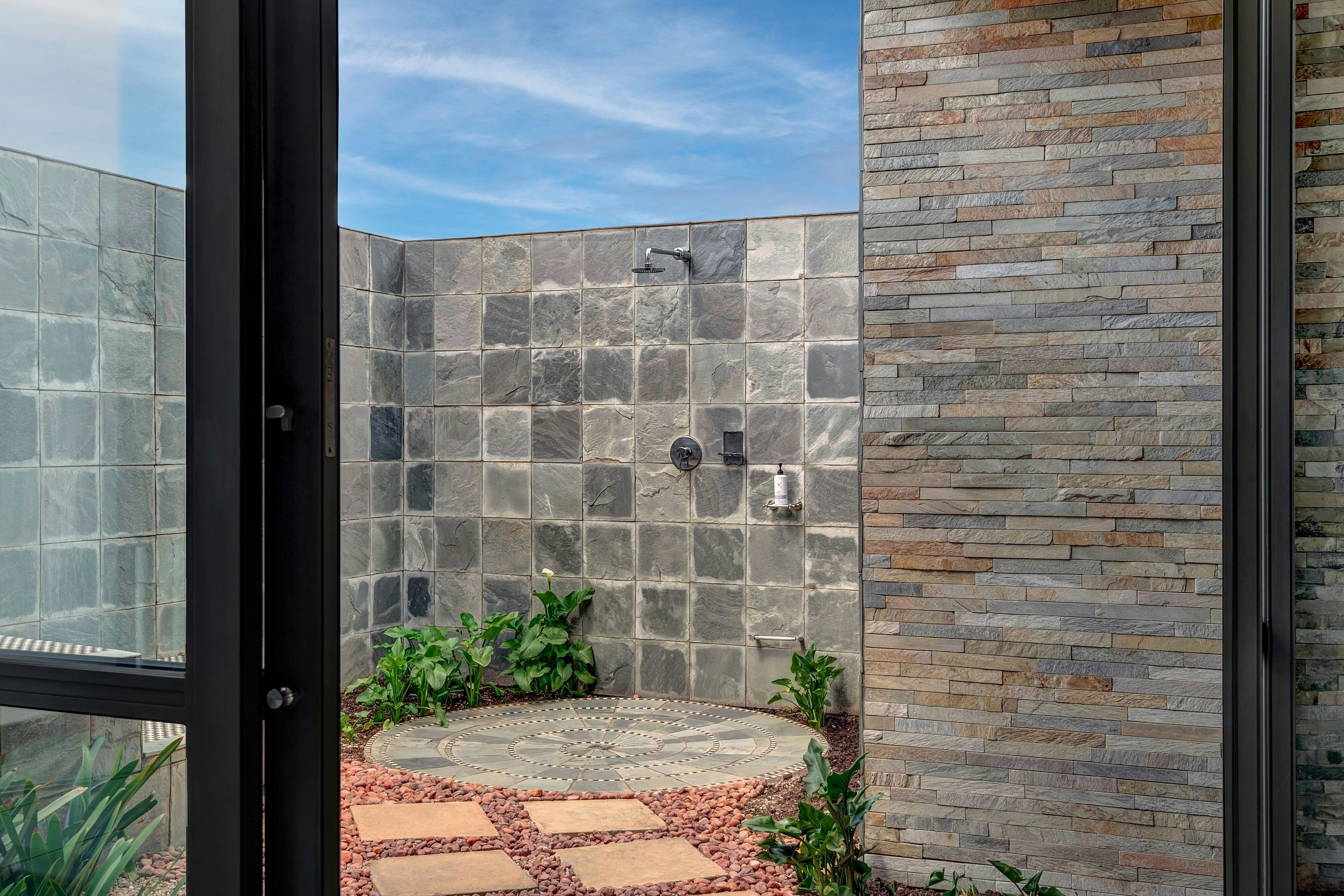 African Pride Melrose Arch Hotel Autograph Collection-guestroom-Outdoor Shower.jpg