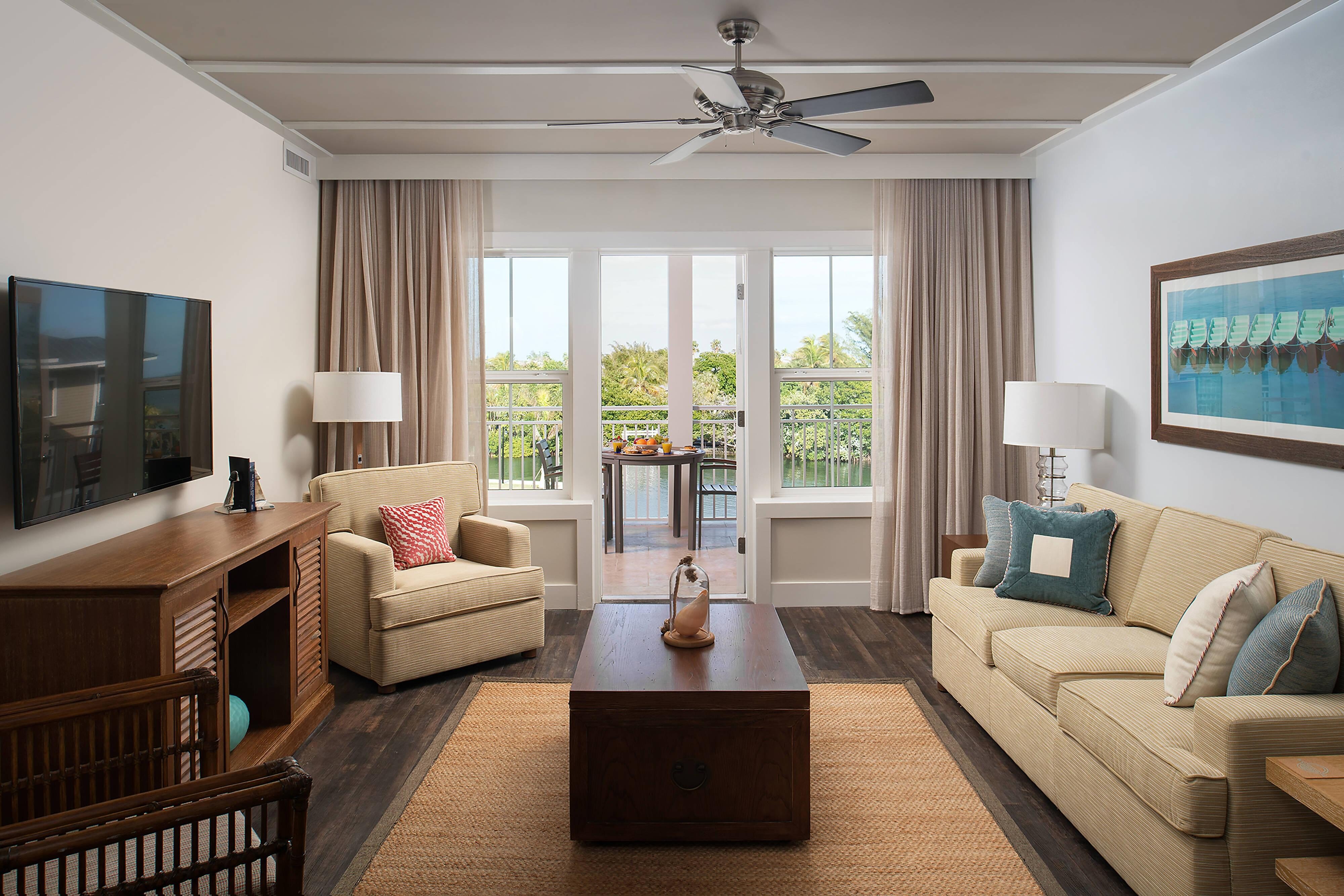 Waterline Villas and Marina Autograph Collection-guestroom-Two-Bedroom Villa Condo - Living Area.jpg