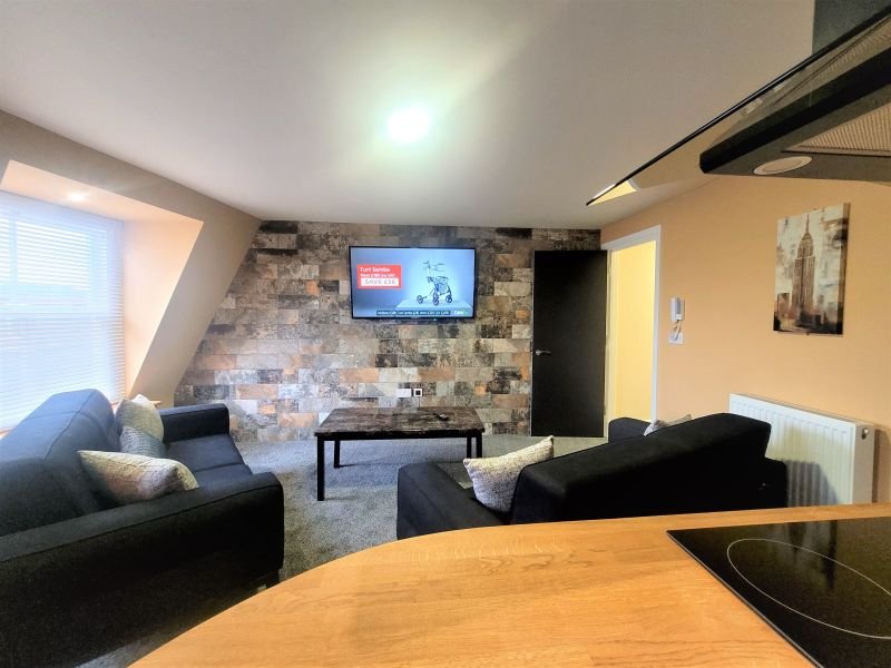 FRIARY HOUSE SERVICED APARTMEN-guestroom-One Bedroom Apartment Living Room.jpg