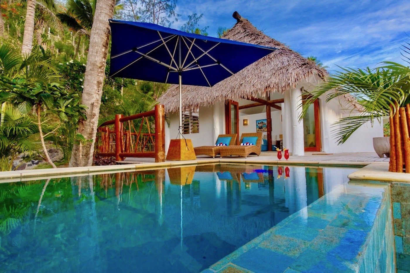 TROPICA ISLAND RESORT-guestroom-Deluxe Pool Bure Exterior.jpg