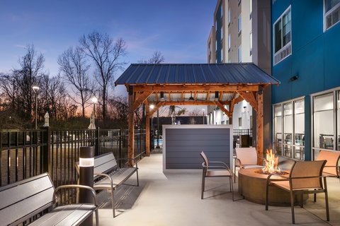 Relax by the fire pit and enjoy a cozy evening outdoors.