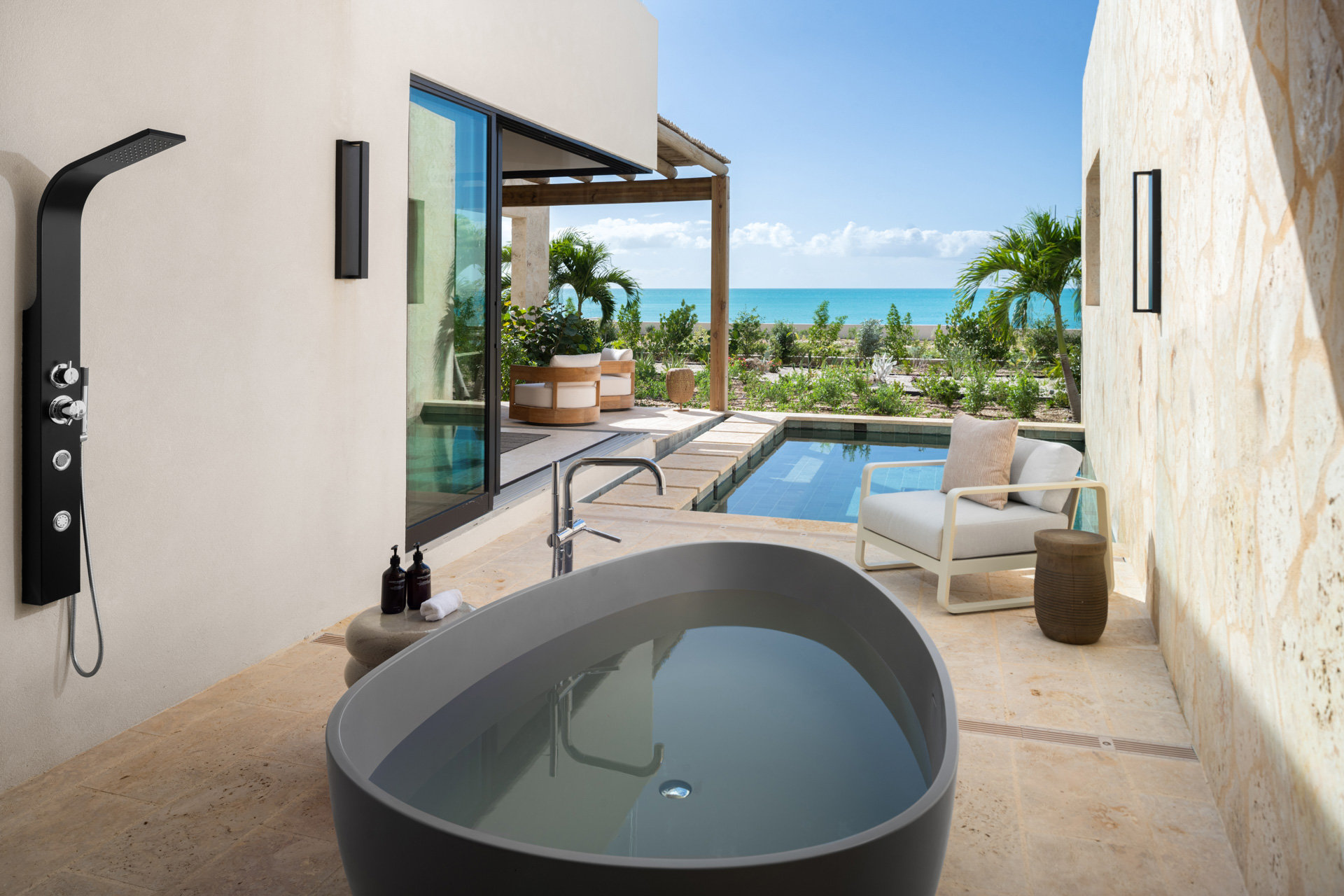 The Strand Turks and Caicos-guestroom-Outdoor Tub & Shower.jpg