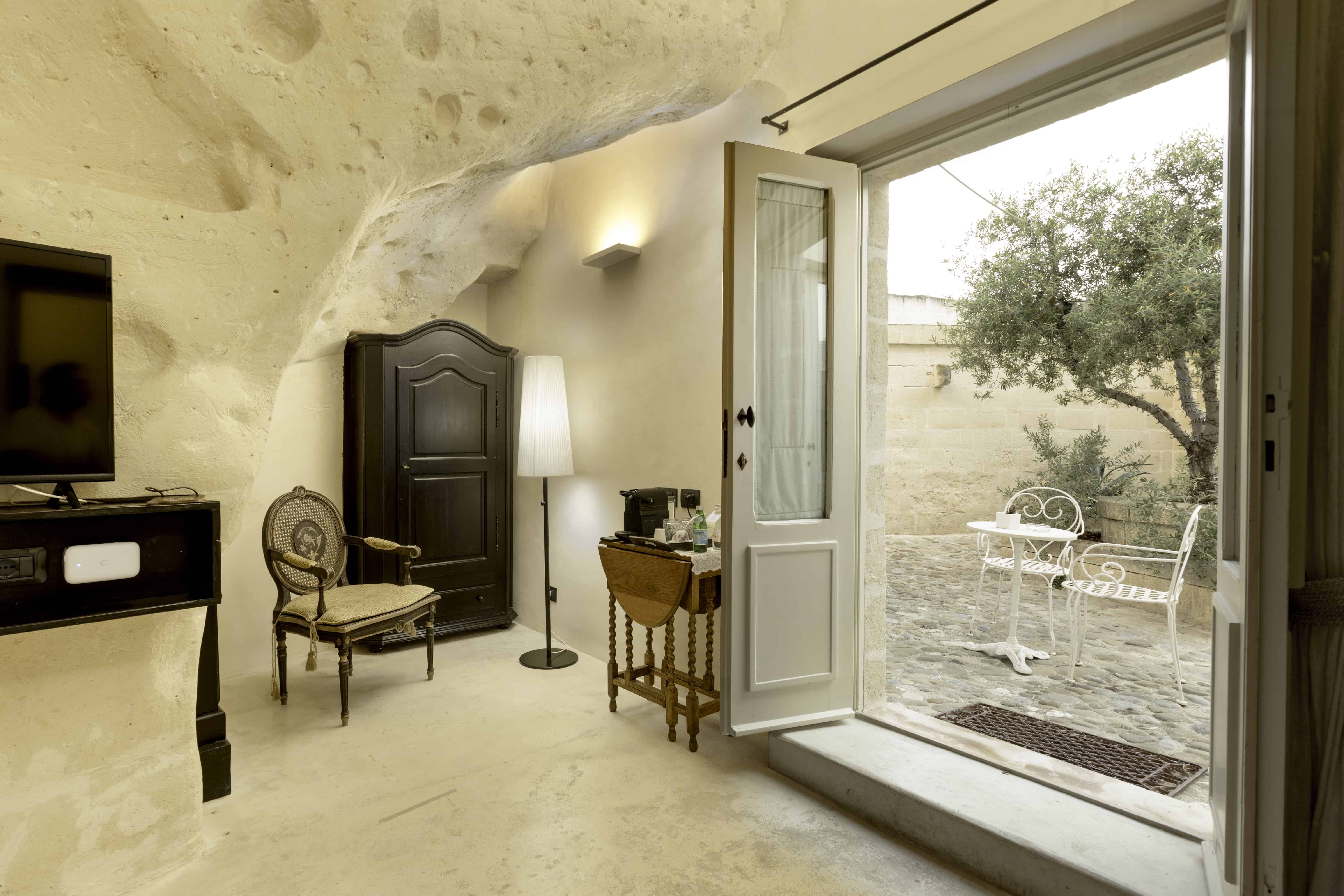 Sant Angelo Matera-guestroom-Cave With Patio - Living Area.jpg