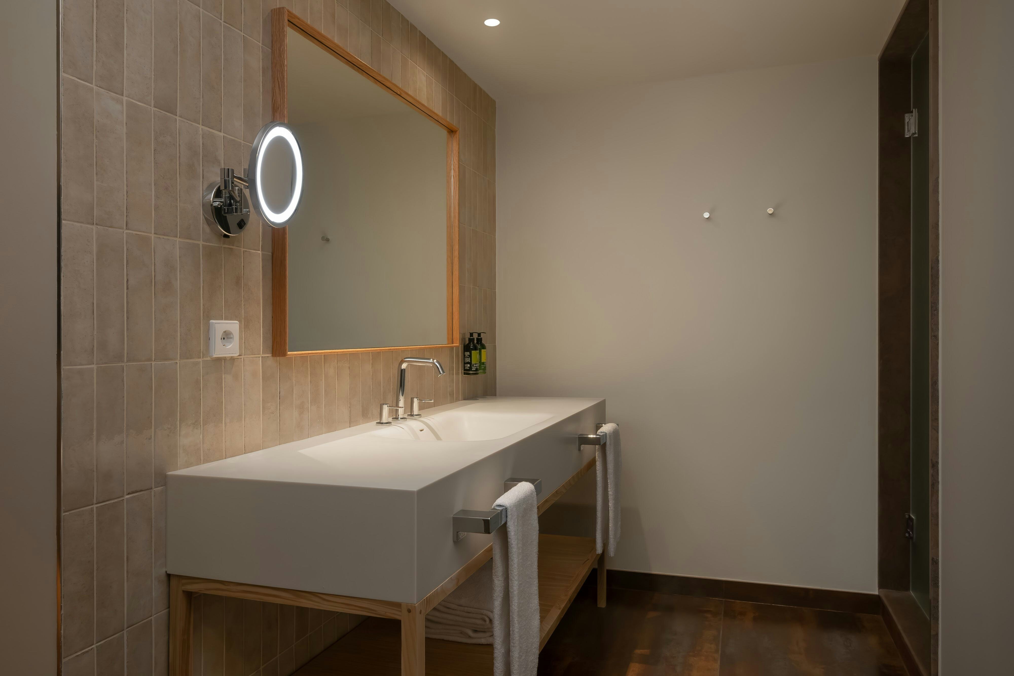 Algarve Marriott Salgados Golf Resort & Spa-guestroom-Elegant bathroom.jpg