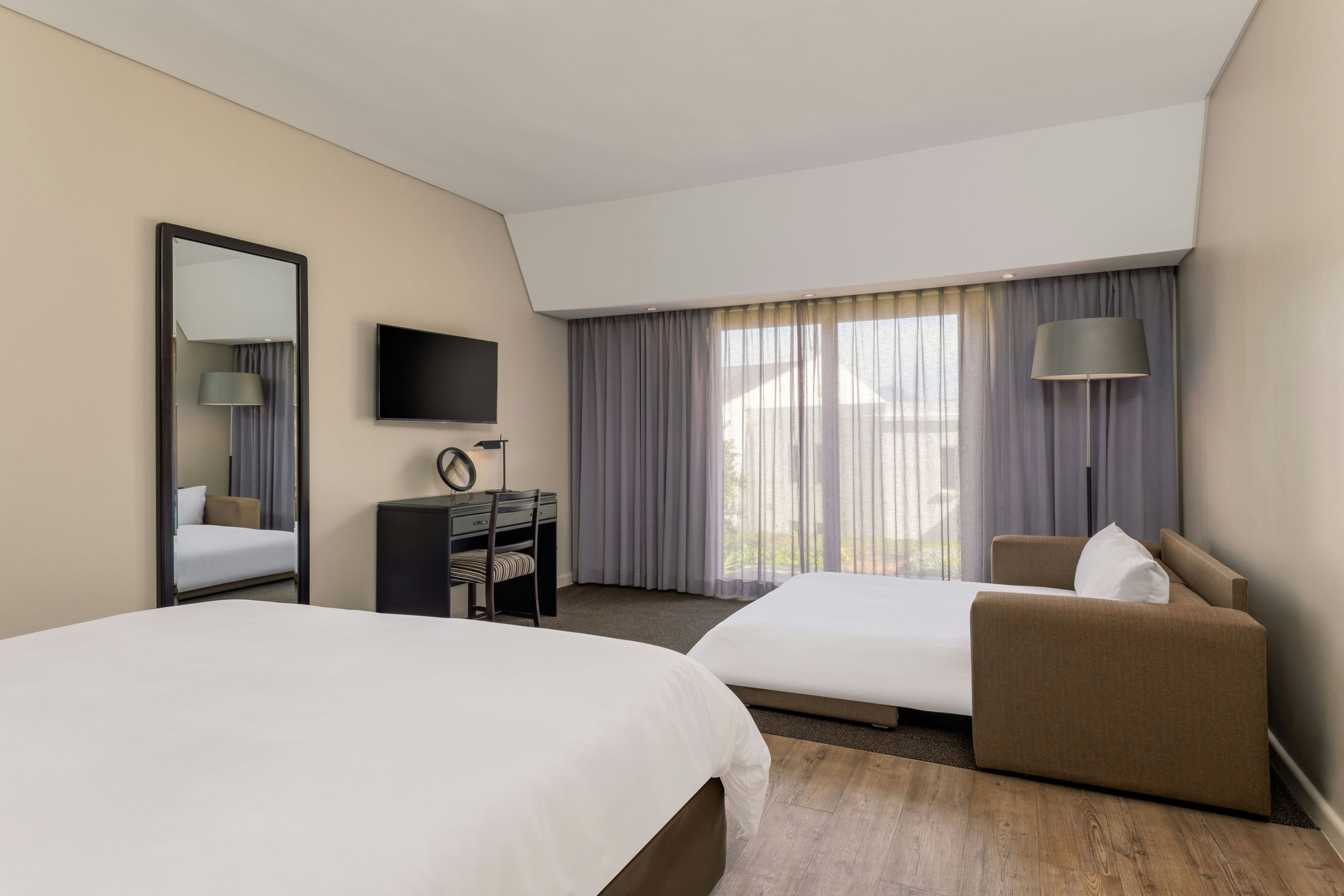 Lord Charles Hotel-Somerset West a Tribute Portfolio Hotel-guestroom-King Room With Sleeper Sofa .jpg