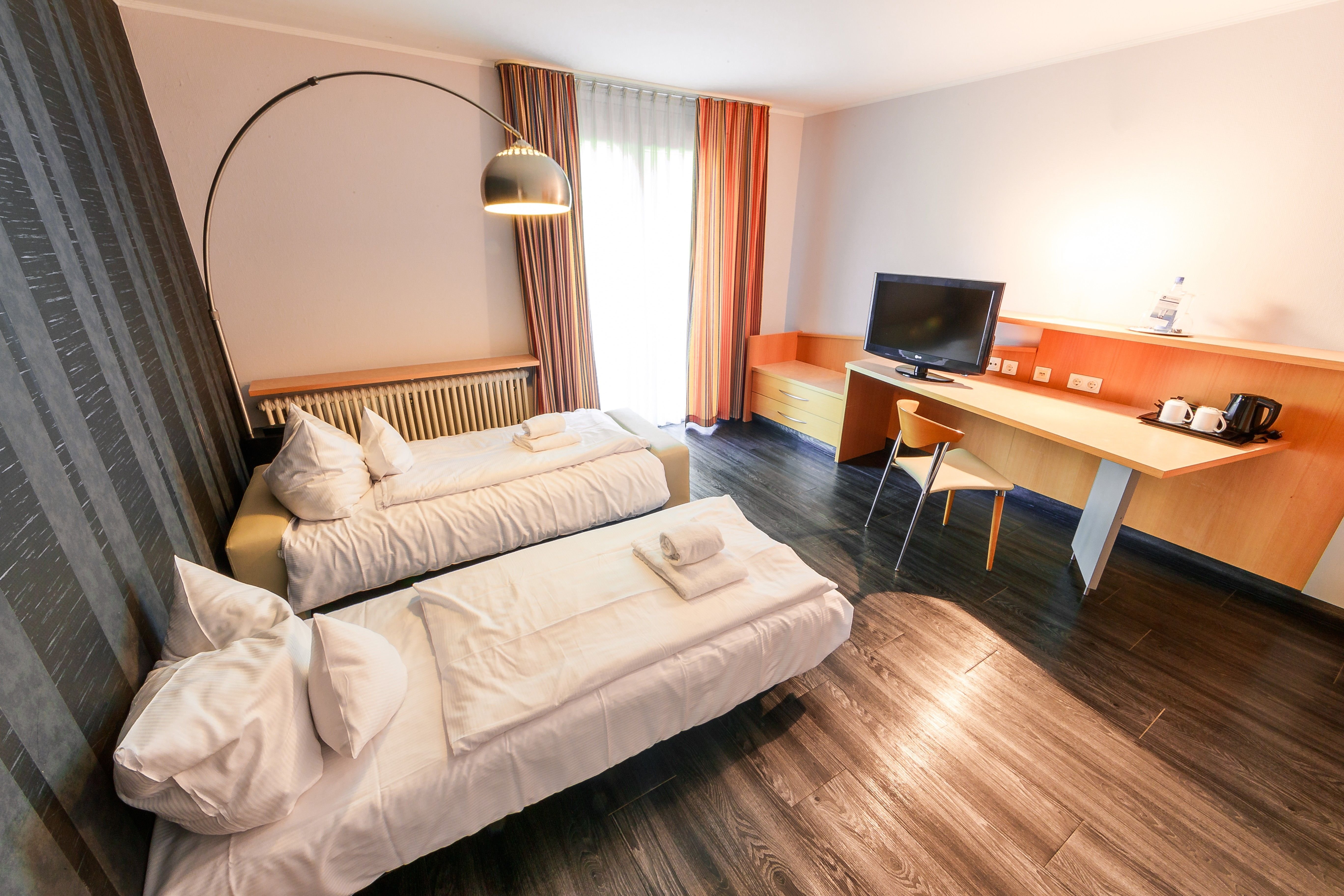 PLAZA INN STUTTGART DITZINGEN-guestroom-Comfort quadruple room.jpg