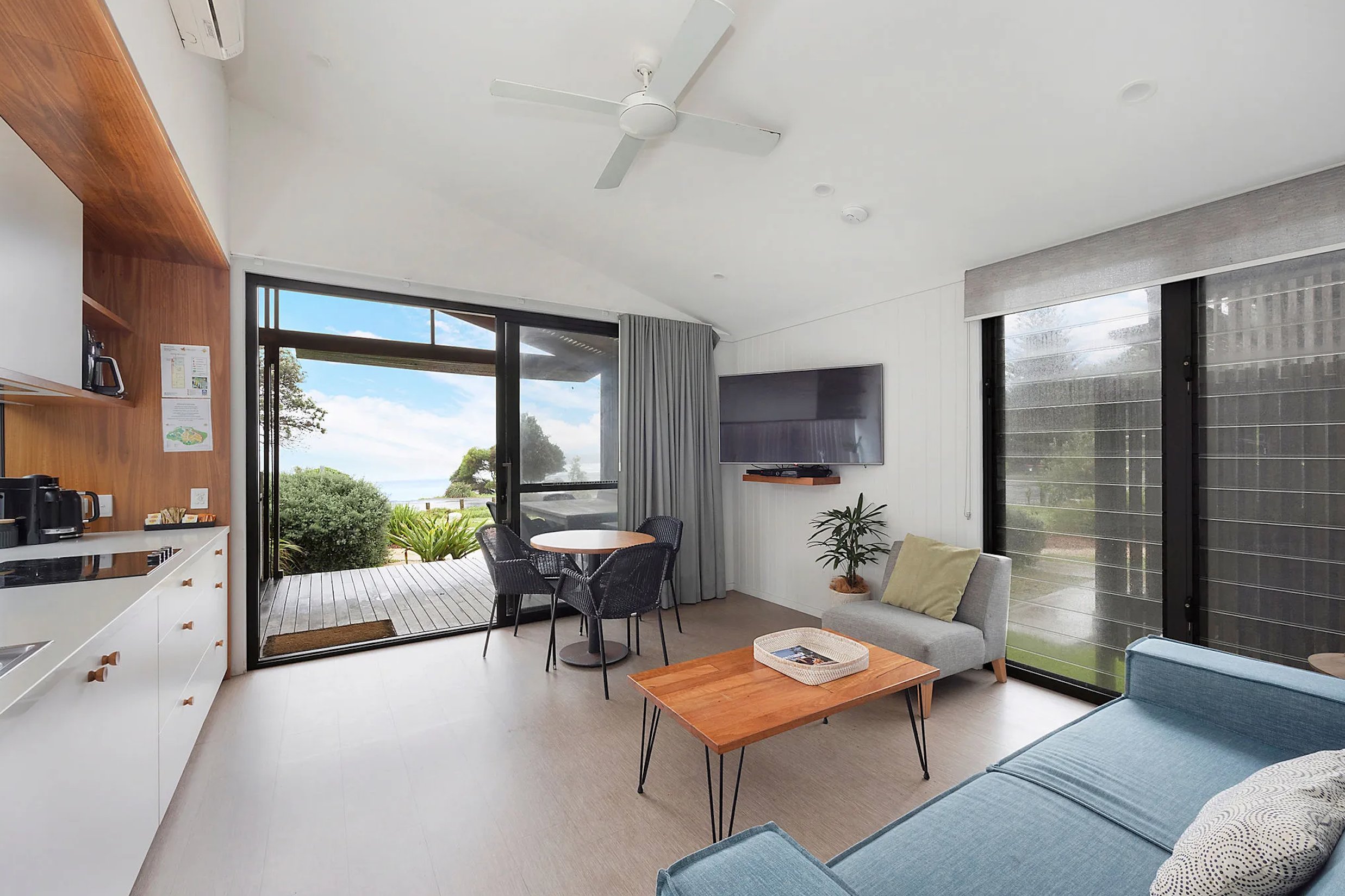 REFLECTIONS SEAL ROCKS - HOLID-guestroom-SE Premium Villa Sleeps Five Living Area.jpg