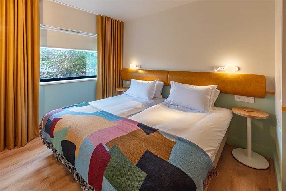SeaSpace-guestroom-Two Bedroom Apartment Bed.jpg