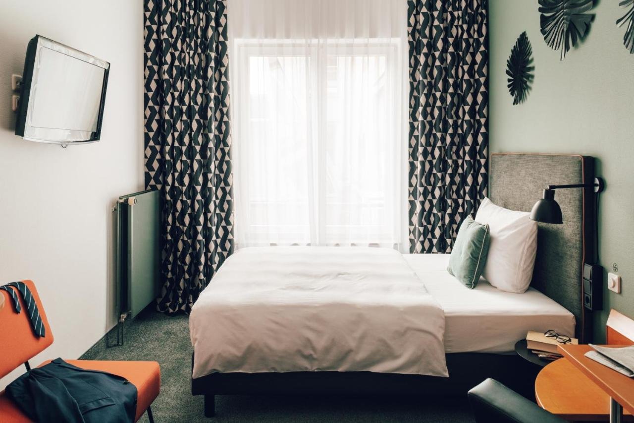 TOWNHOUSE STADT HAMBURG WISMAR-guestroom-Single Room.jpg