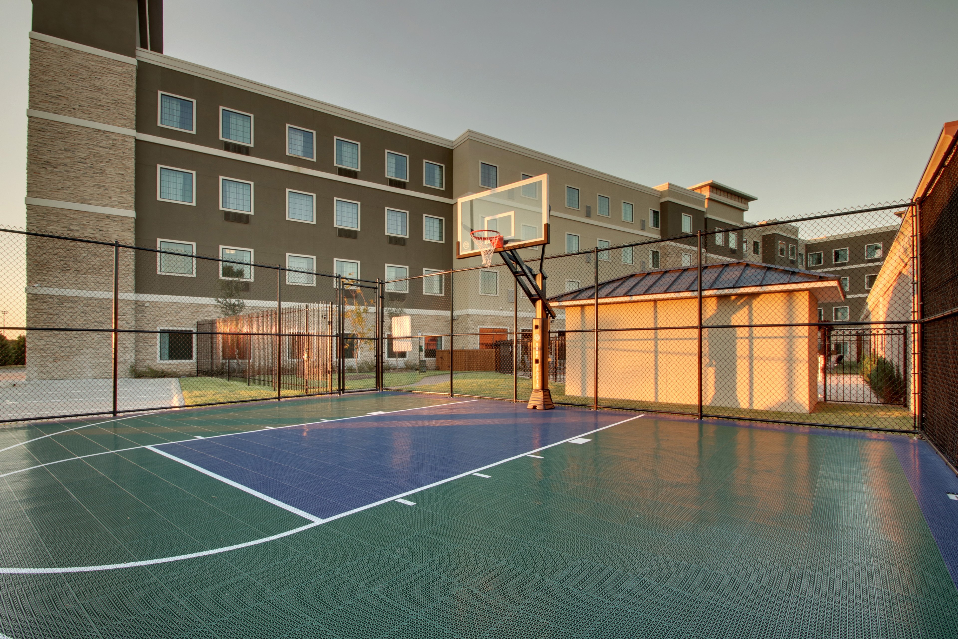 STAYBRIDGE STES THE COLONY BY IHG-guestroom-Stay active with our Outdoor Sport Court at Staybridge Suites.jpg