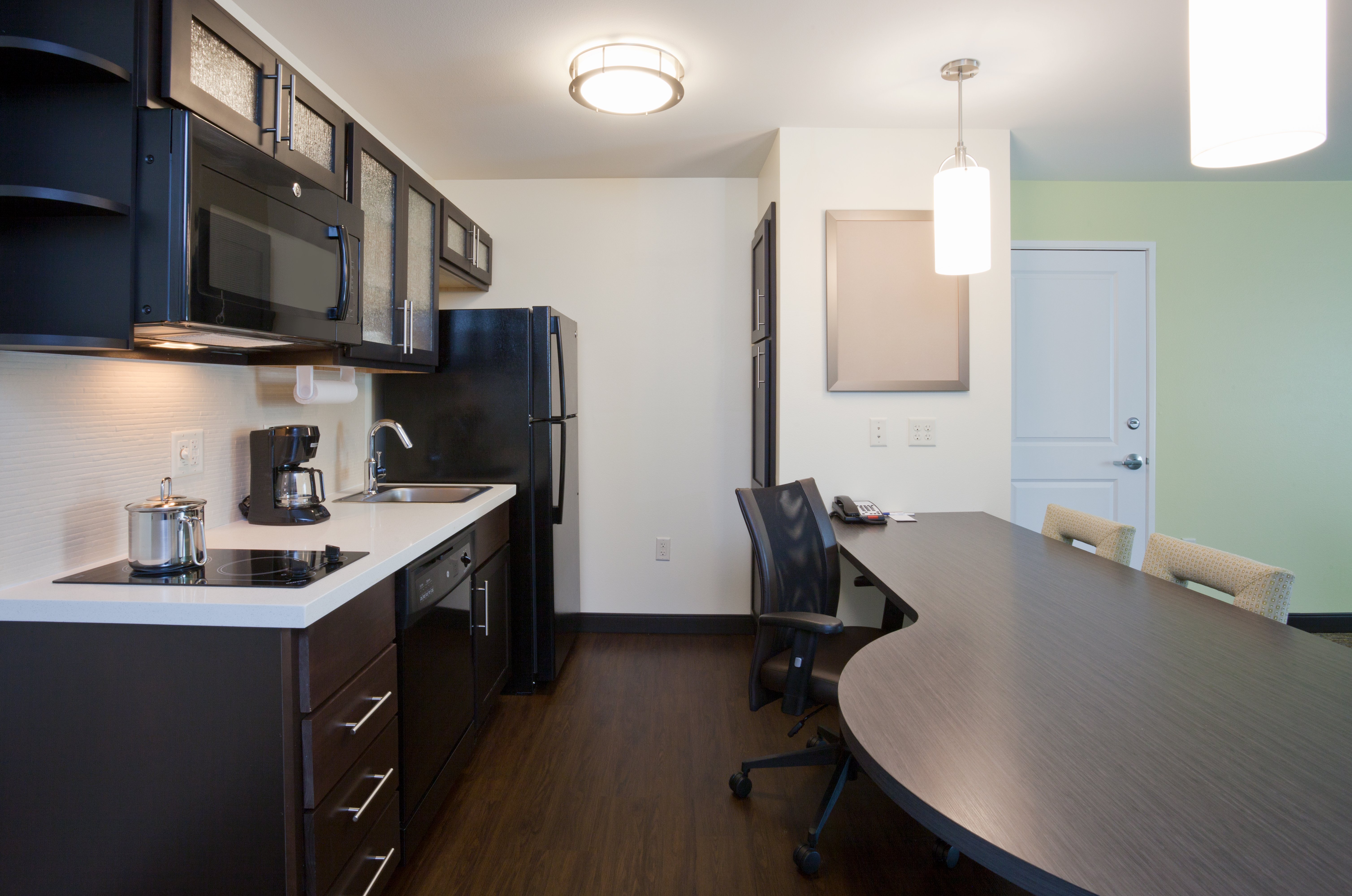 Kitchen and Office in our One Bedroom King Suite