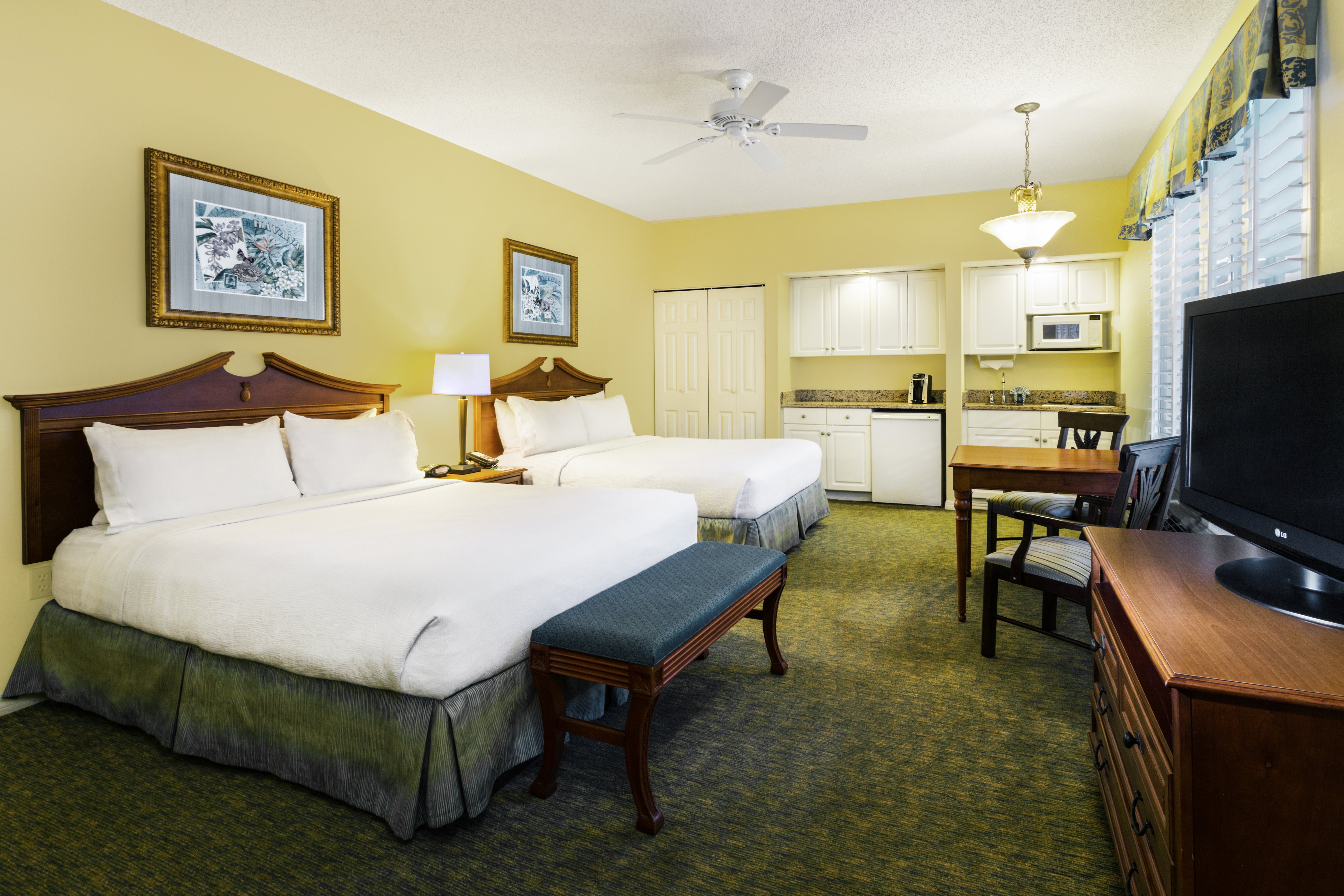 HOLIDAY INN HOTEL AND SUITES BY IHG-guestroom-2 Queen Beds Premium Rooms feature Kitchenettes..jpg