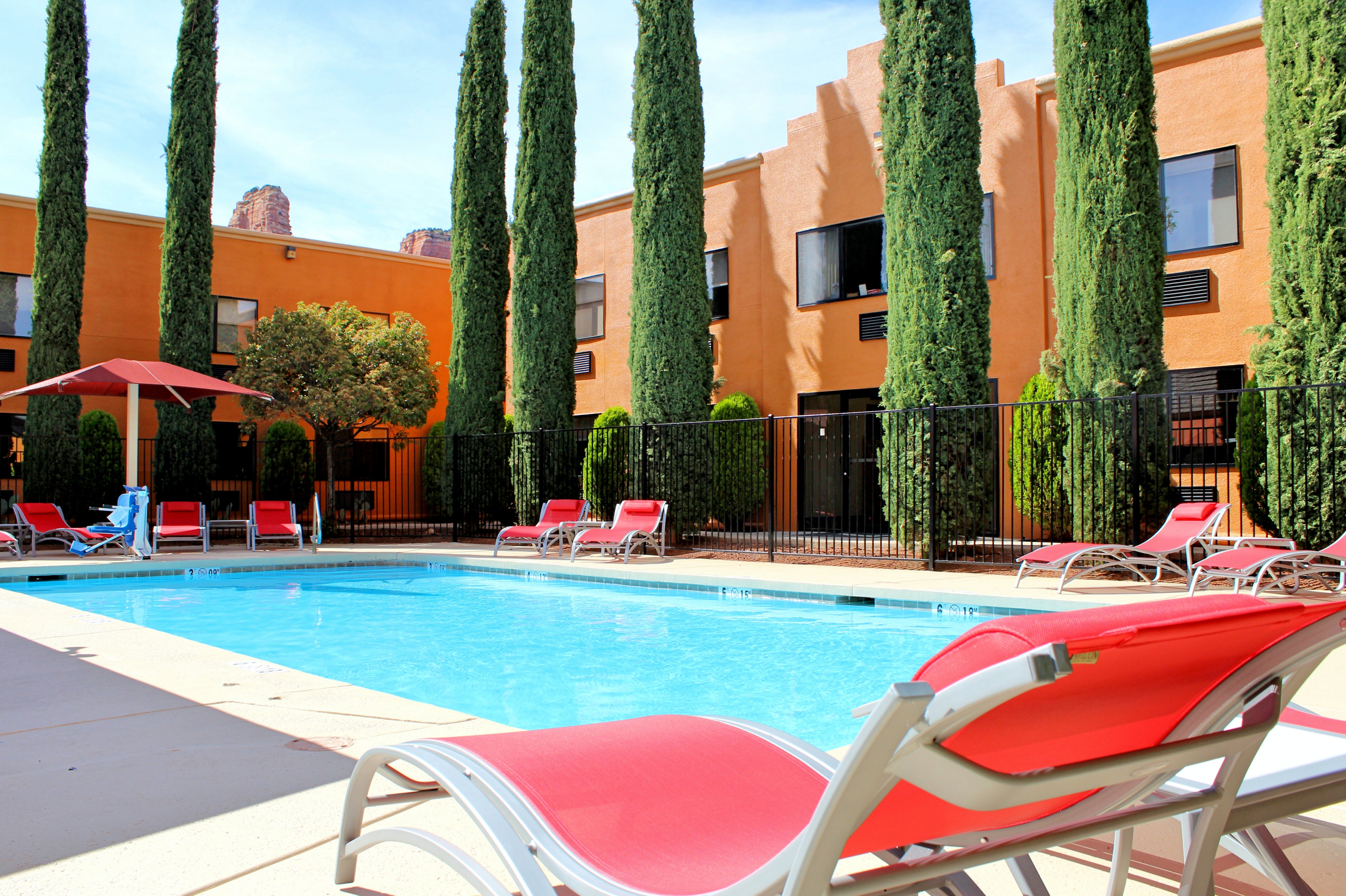 Relax and unwind in our beautiful outdoor pool and hot tub