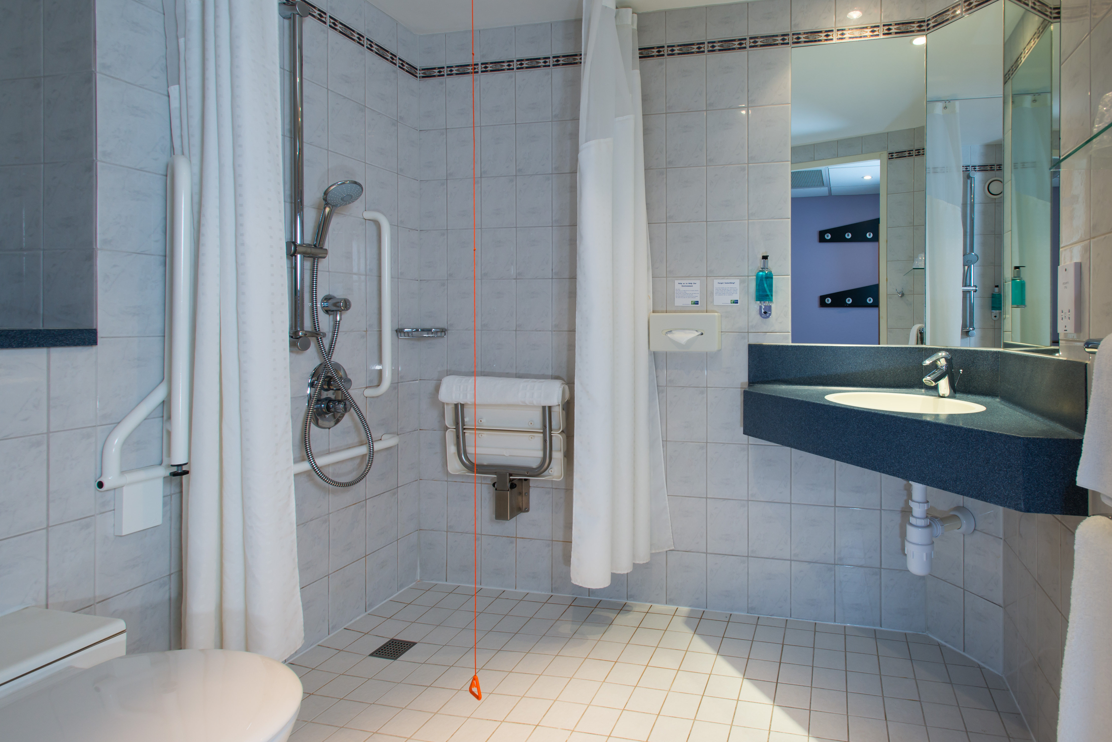 HOLIDAY INN EXPRESS WANDSWORTH BY I-guestroom-Our accessible bathrooms are fully equipped for your convenience.jpg