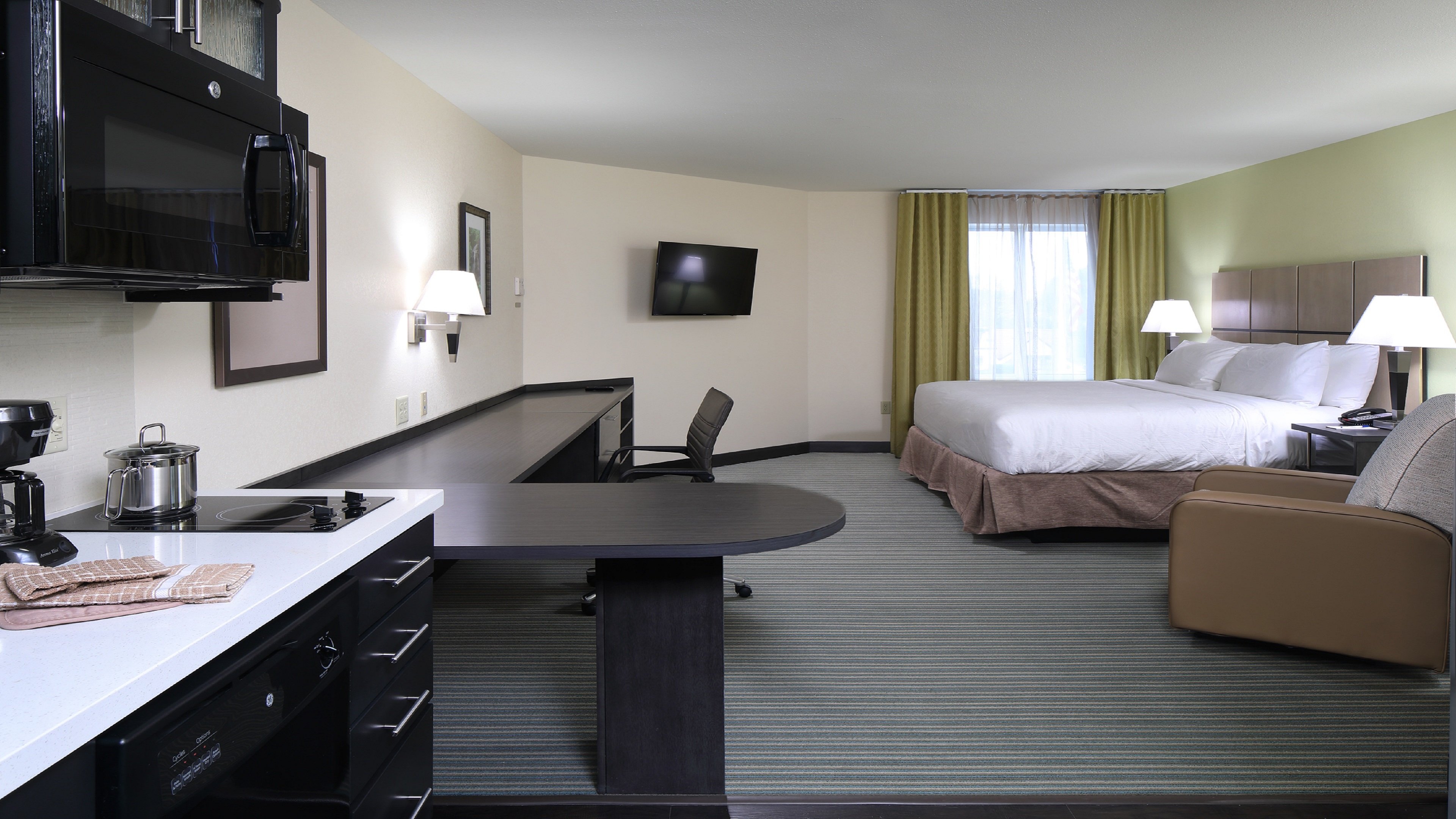 CANDLEWOOD STES SOUTH BY IHG-guestroom-King Suite.jpg