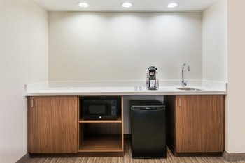 Suites feature wet bar, fridge, microwave and Keurig coffee