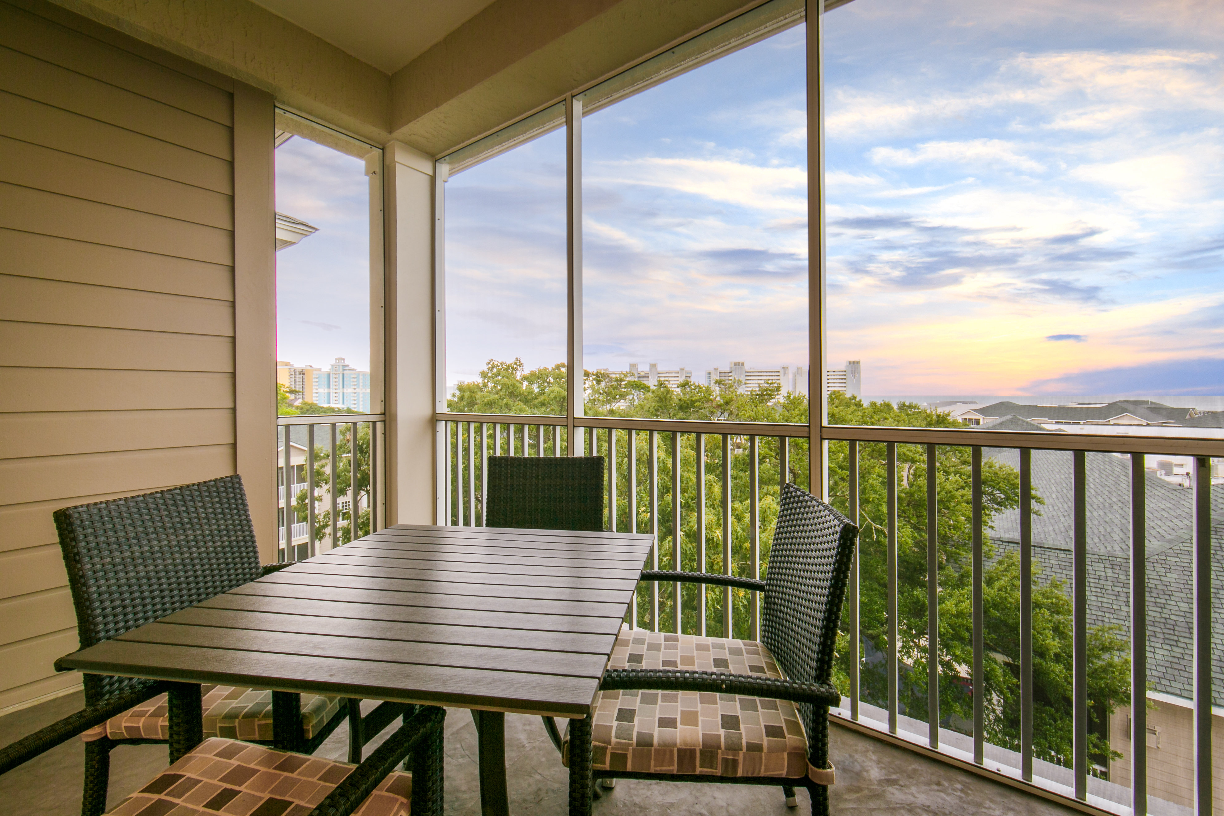 HOLIDAY INN CLUB VAC SOUTH BCH-guestroom-Furnished balcony in a Signature Collection suite to enjoy.jpg