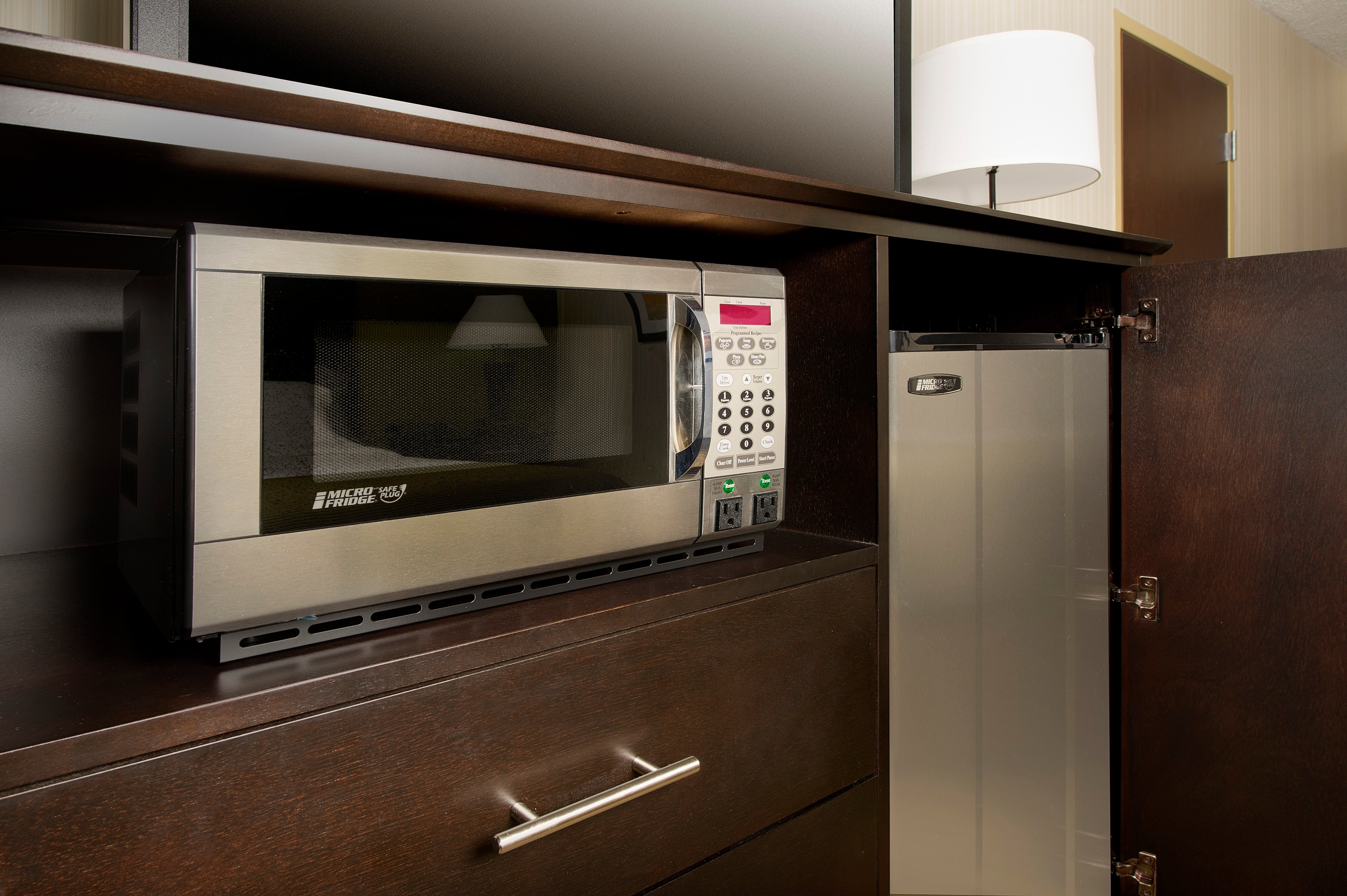 HOLIDAY INN EXPRESS DC BW PKWY BY I-guestroom-Microwave and Refrigerator conveniently placed in each room.jpg