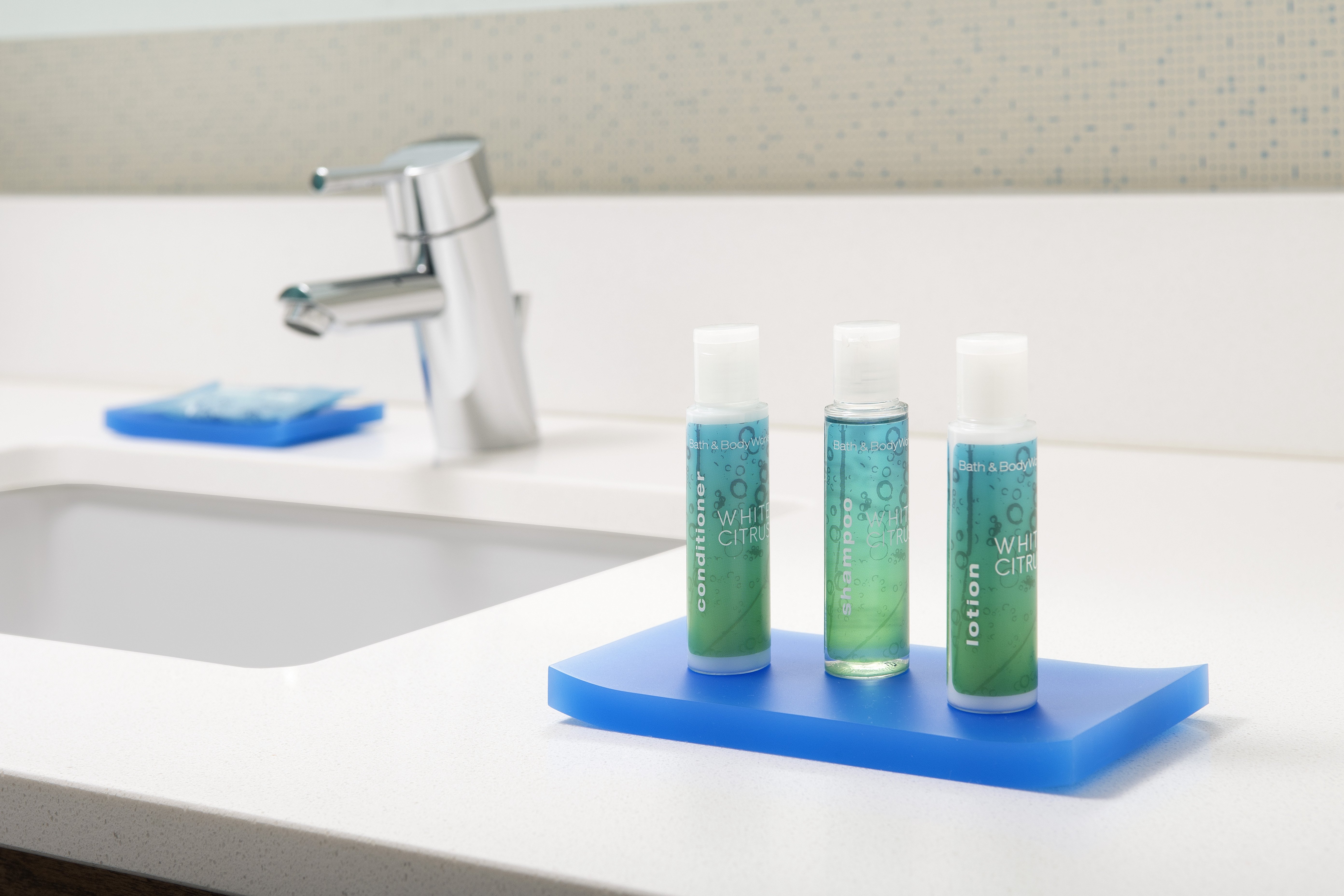 HOLIDAY INN EXP STES COLLEGE P-guestroom-Enjoy complimentary shampoo, conditioner and lotion in your room.jpg