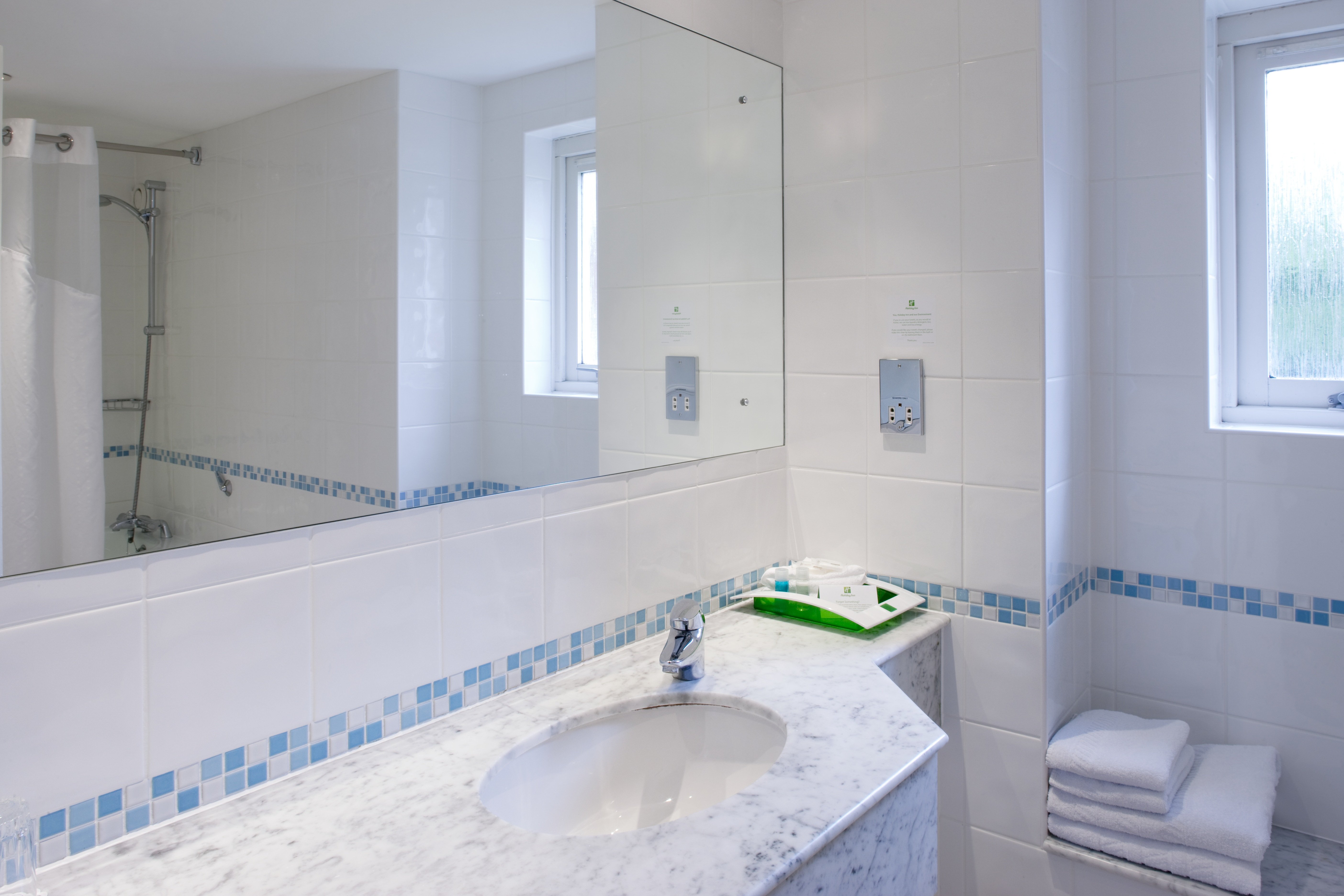 HOLIDAY INN FARNBOROUGH BY IHG-guestroom-En-suite bathroom in our hotel room.jpg