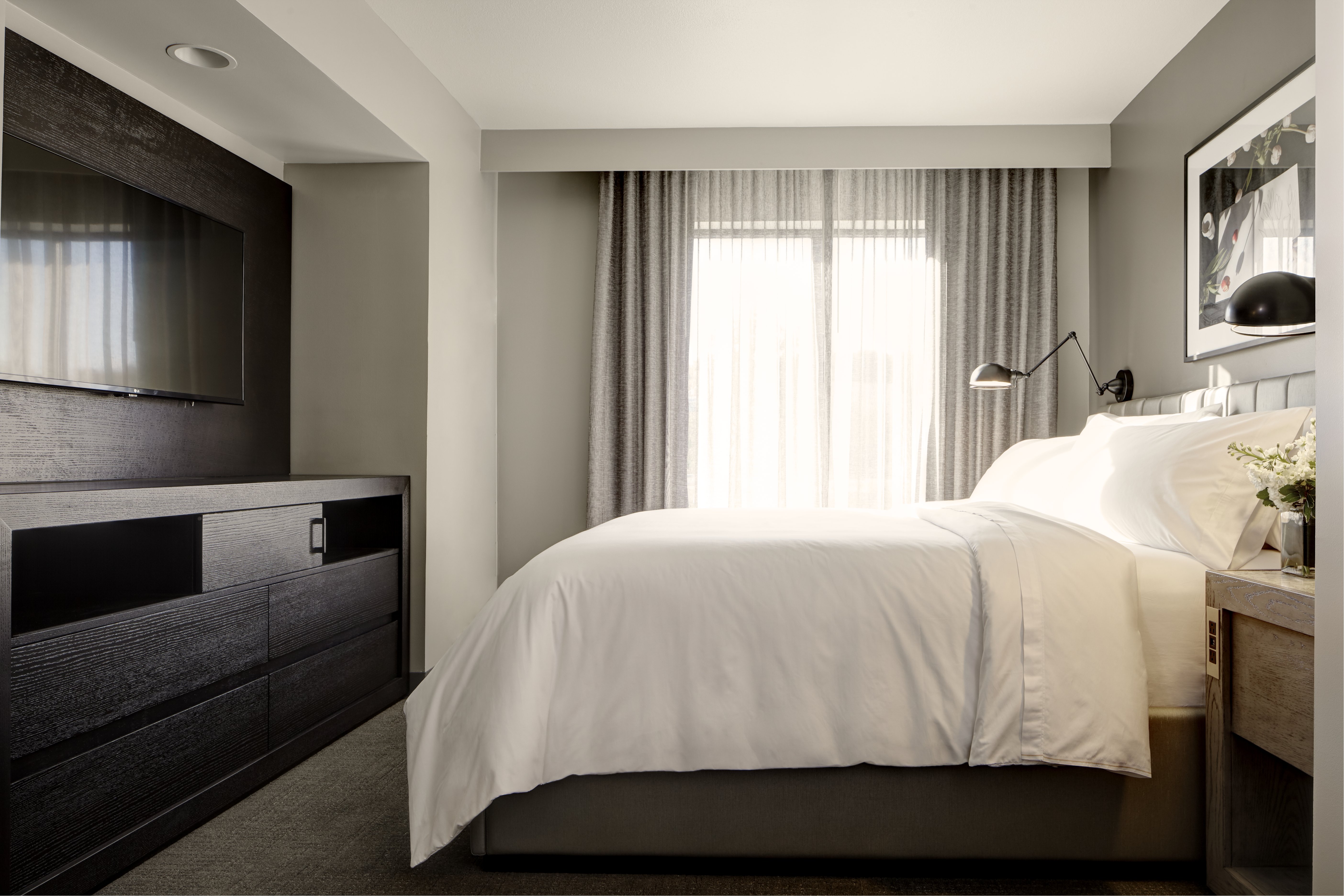 ARCHER HOTEL FLORHAM PARK-guestroom-Archer Hotel Florham Park Archer's Den Bedroom.jpg