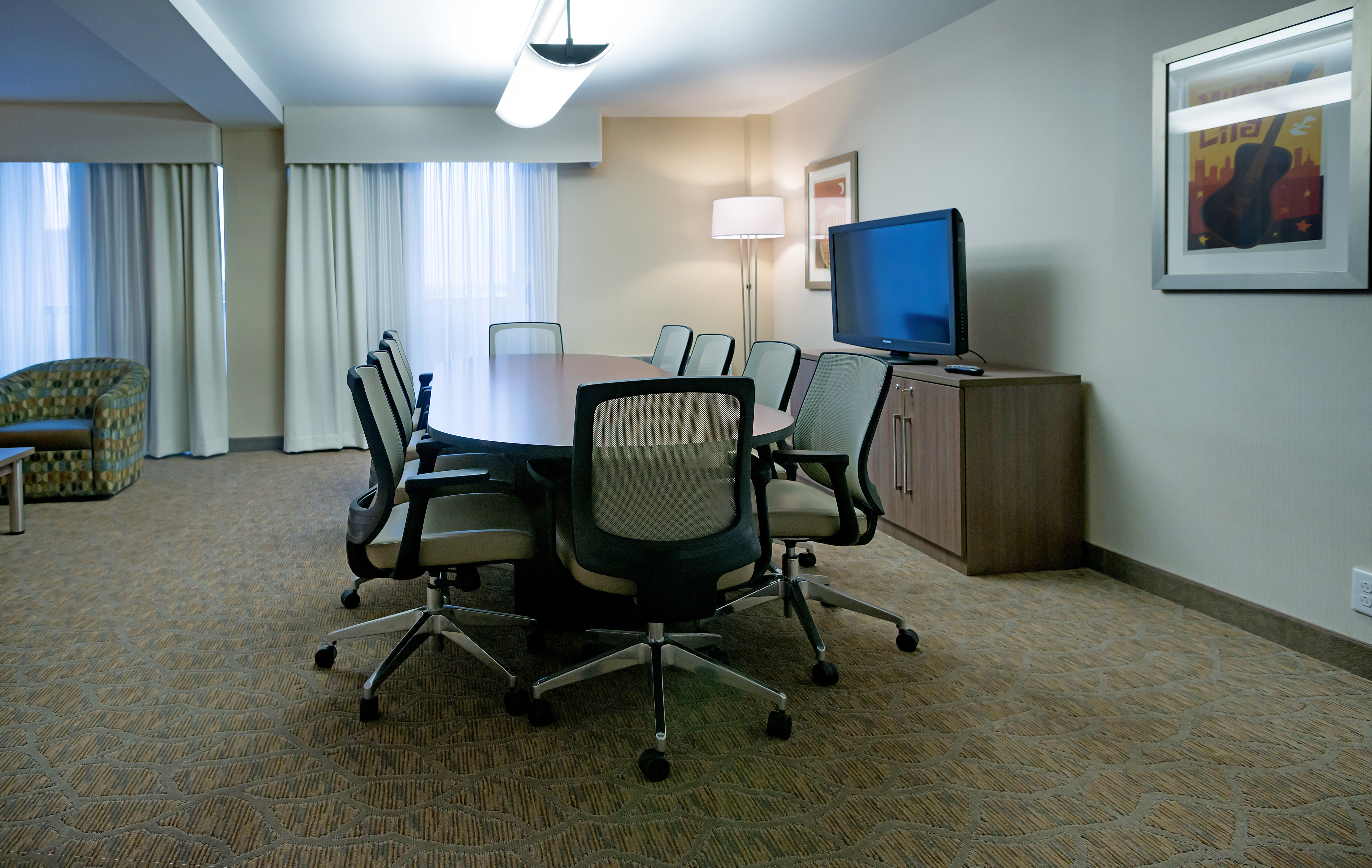 Holiday Inn Vanderbilt Suite with Conference Table & Sitting Area