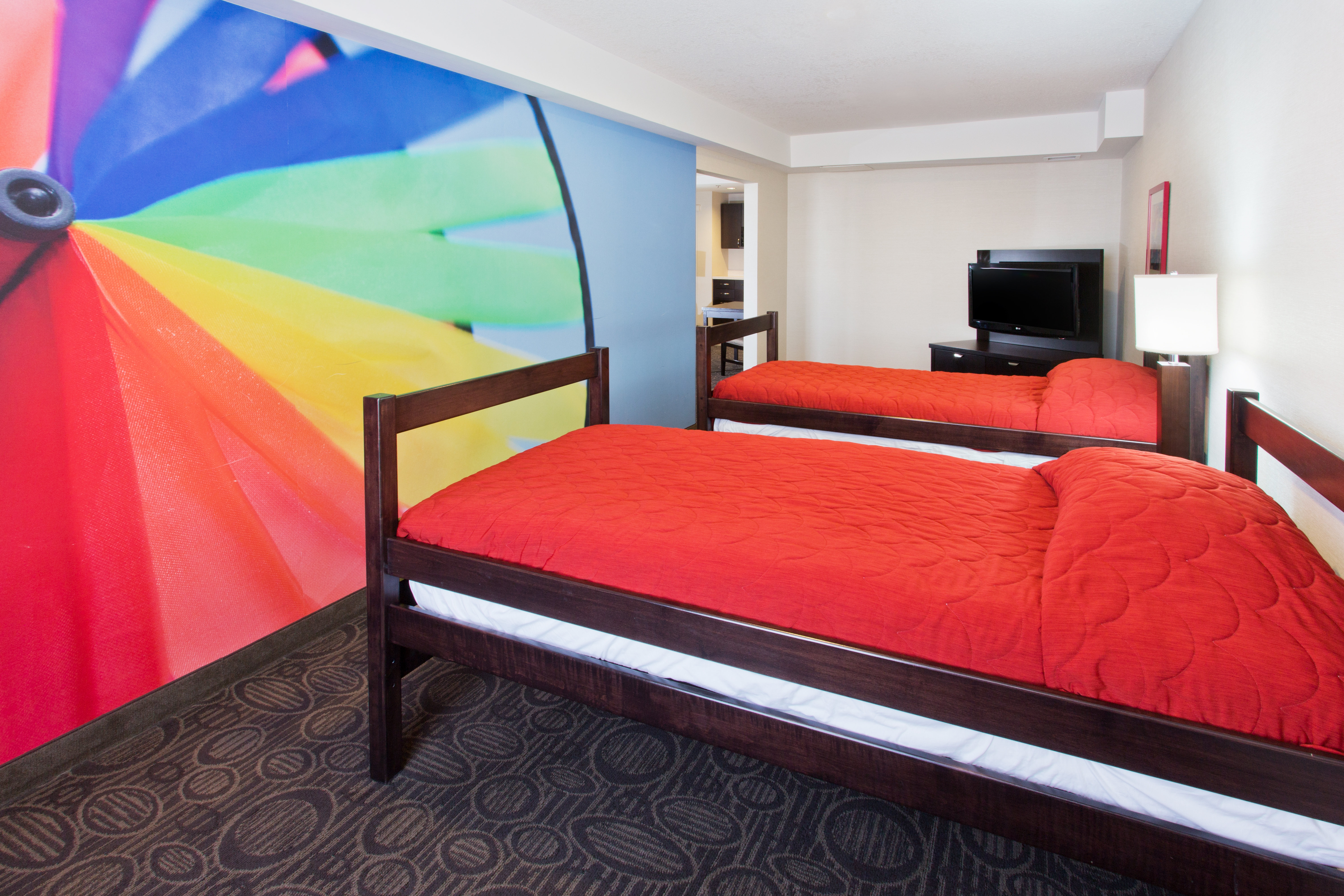 Vibrant Two Bedroom Family Suite with Custom Mural