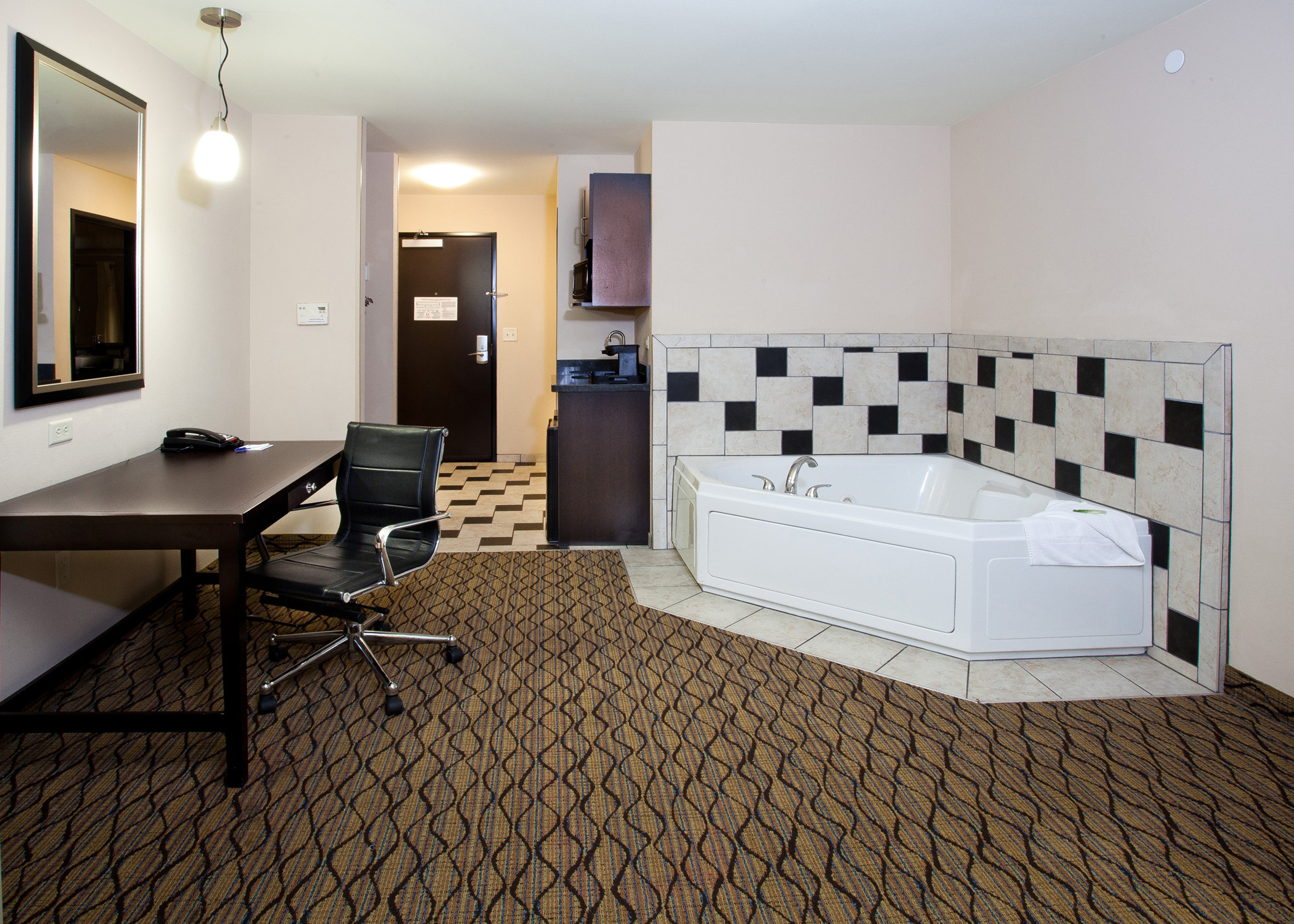HOLIDAY INN EXP STES BIXBY BY IHG-guestroom-Jacuzzi Suite.jpg