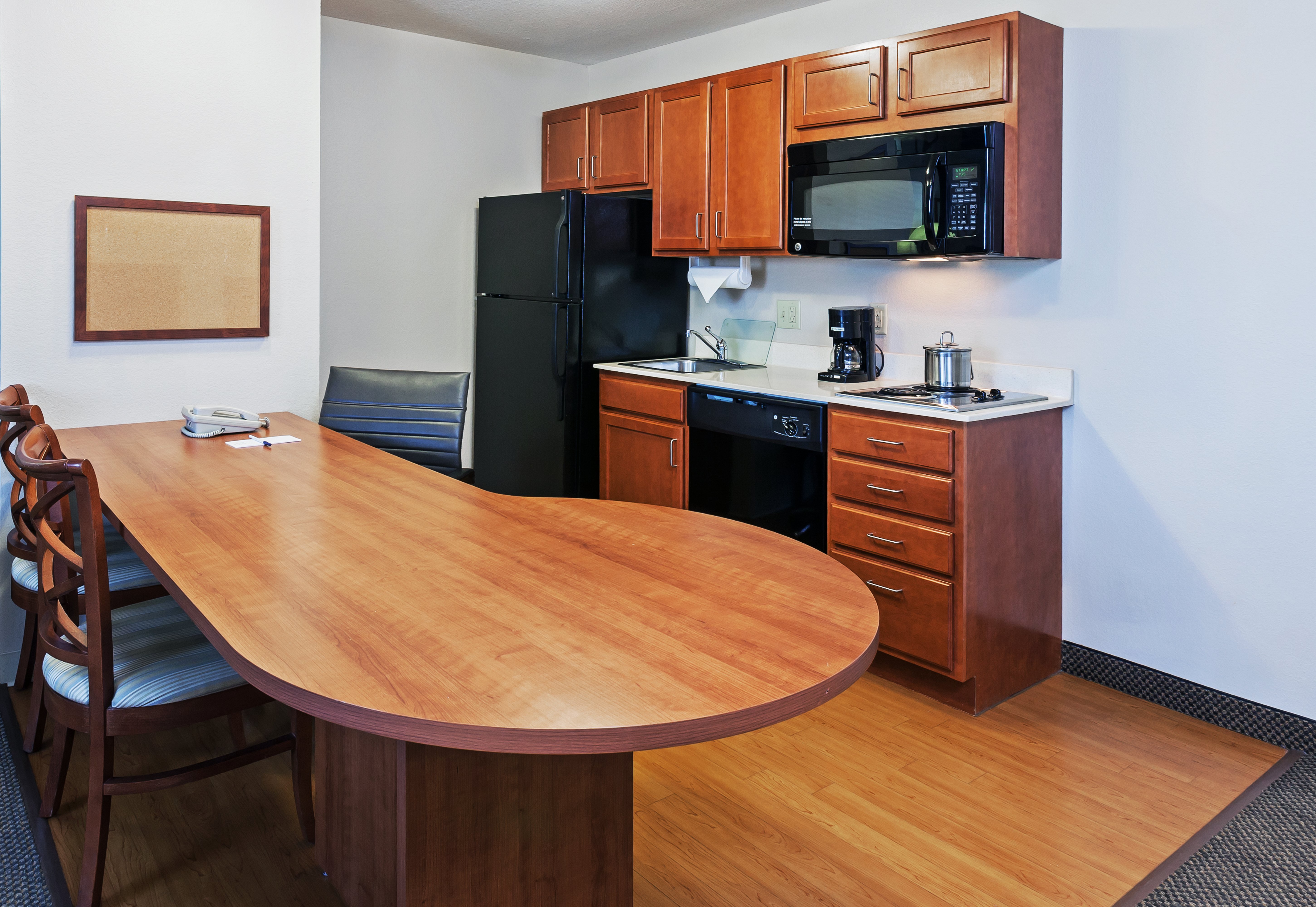 CANDLEWOOD SUITES OWASSO BY IHG-guestroom-Full Kitchen Just Like Home.jpg