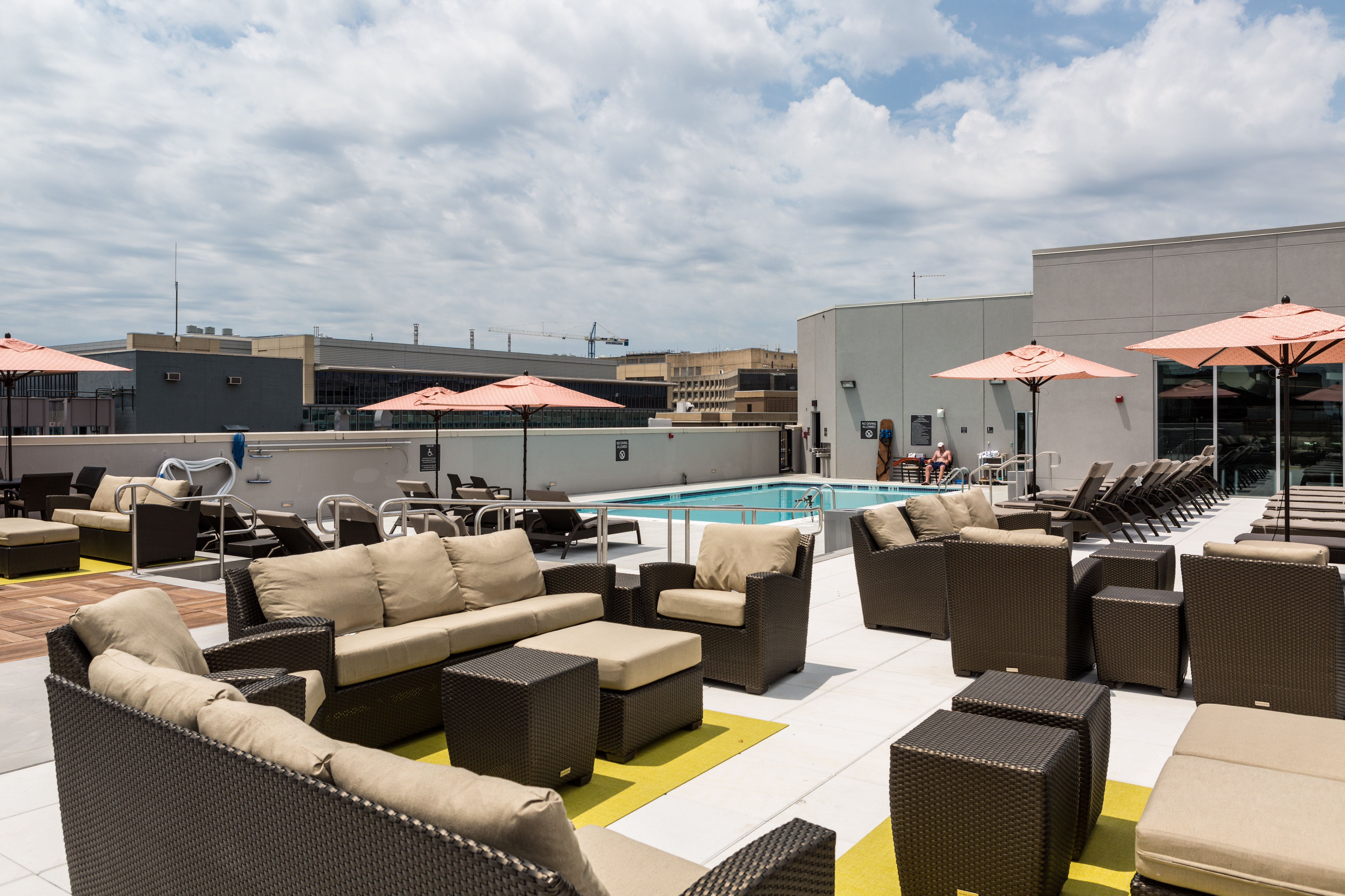 Umbrellas, sofas, chairs, and recliners available on the roof.