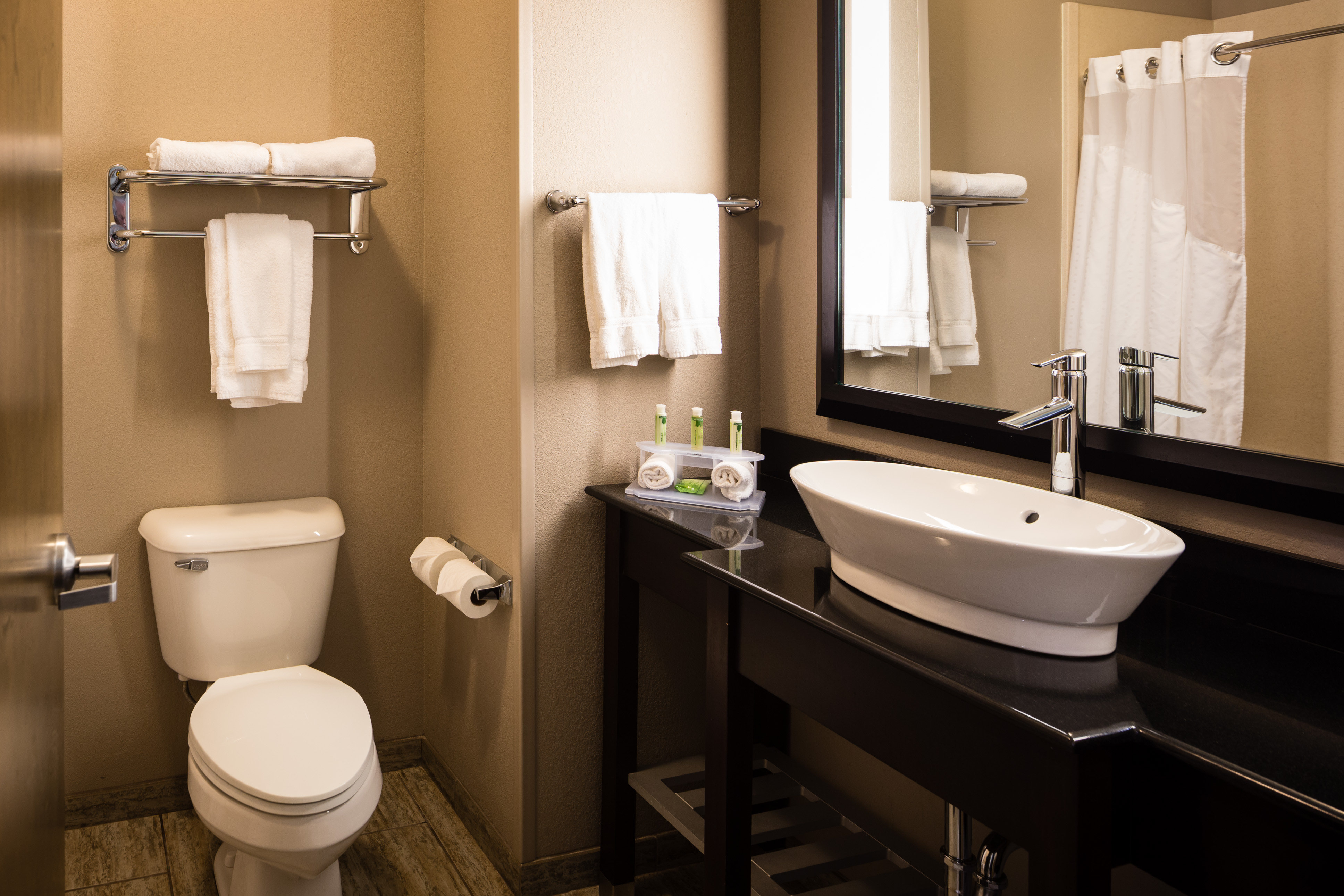 HOLIDAY INN EXP STES EL RENO BY IHG-guestroom-Guest Bathroom.jpg