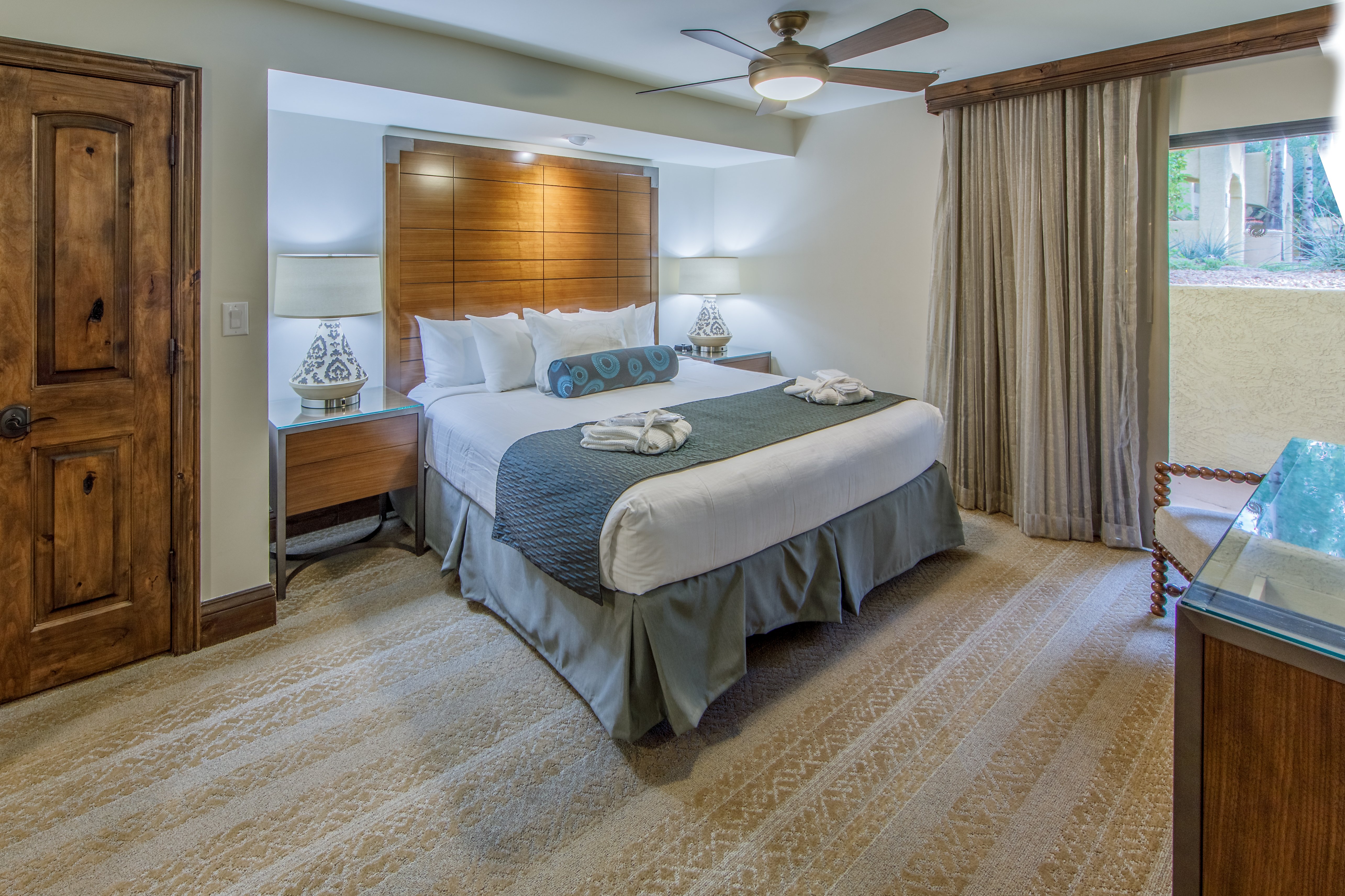 Signature master bedroom with bathrobes pamper you in style