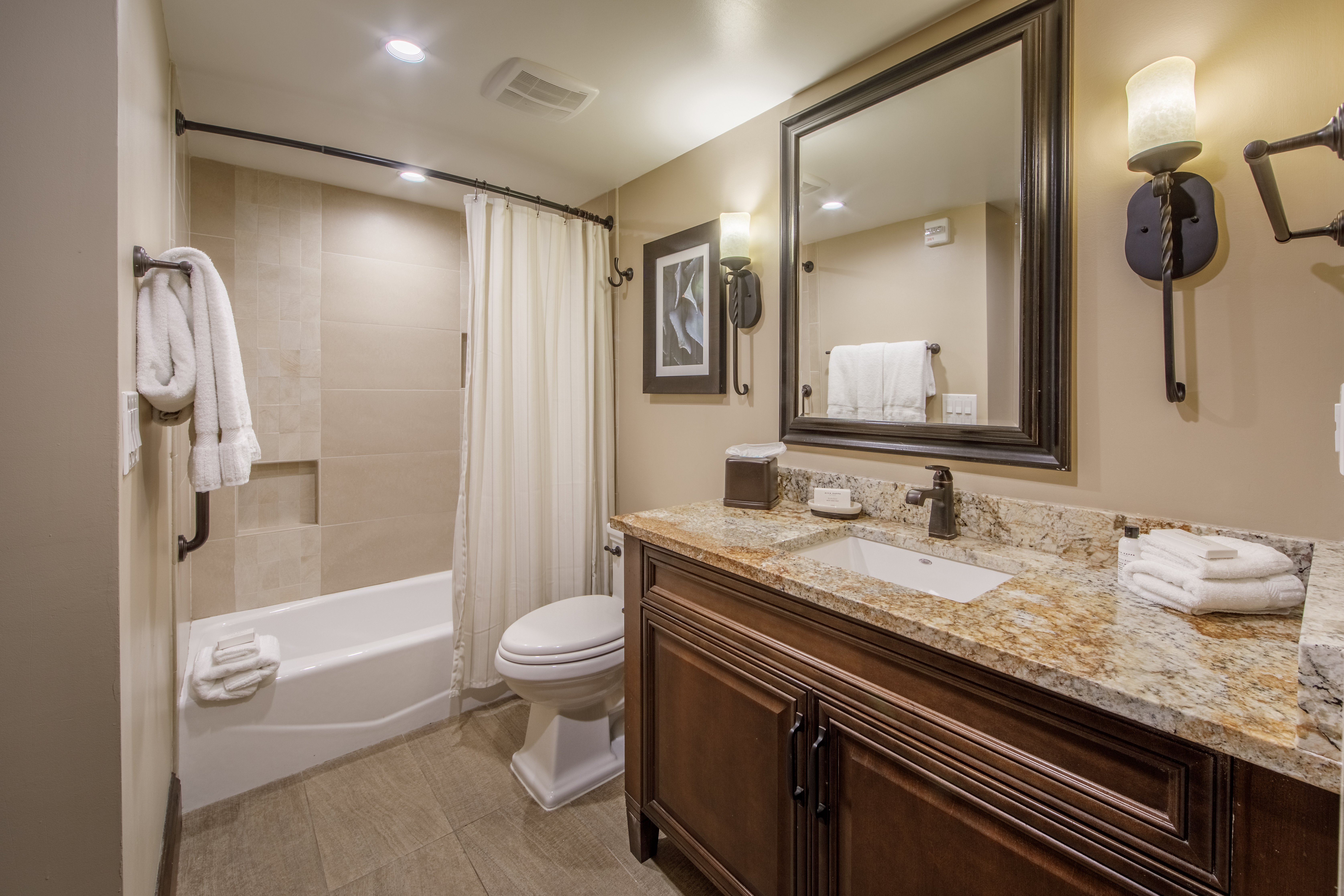 Signature collection bathrooms offer upgraded counter tops