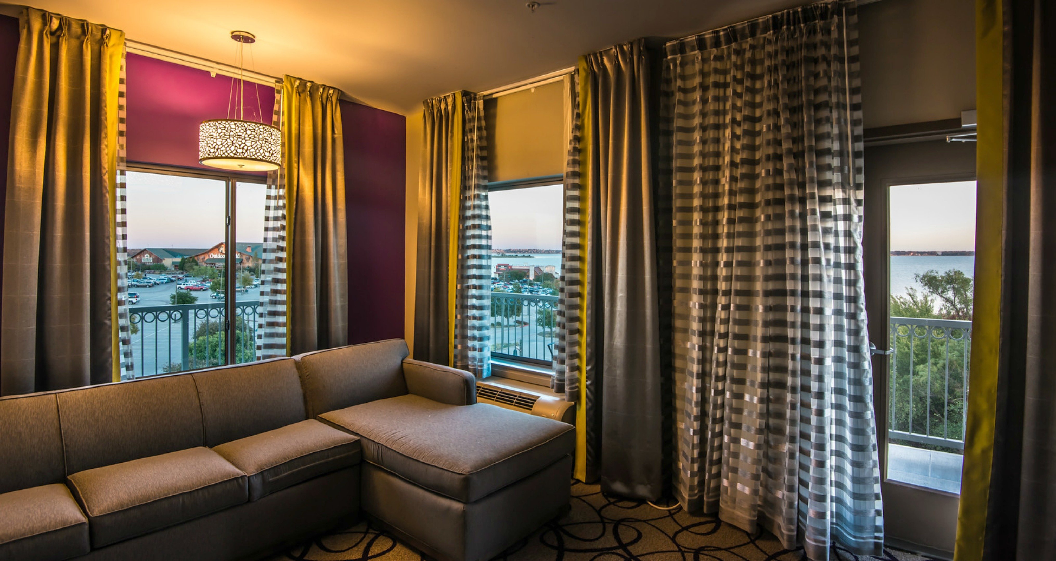 HOLIDAY INN EXP STES GARLAND E BY I-guestroom-Sectional sofa - with amazing views.  Kick back and relax..jpg