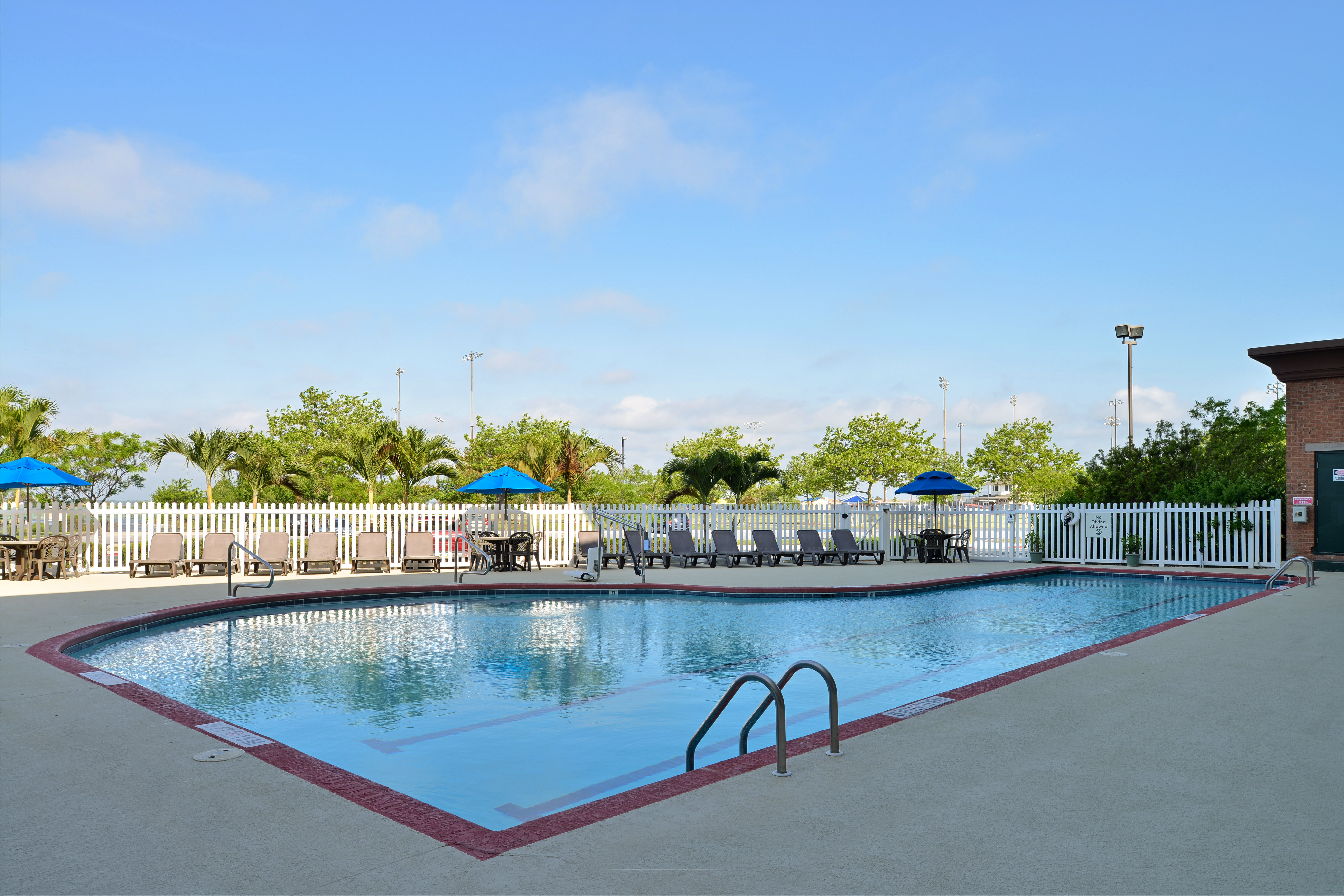 Enjoy the scenic view of Northside Park while relaxing at the pool
