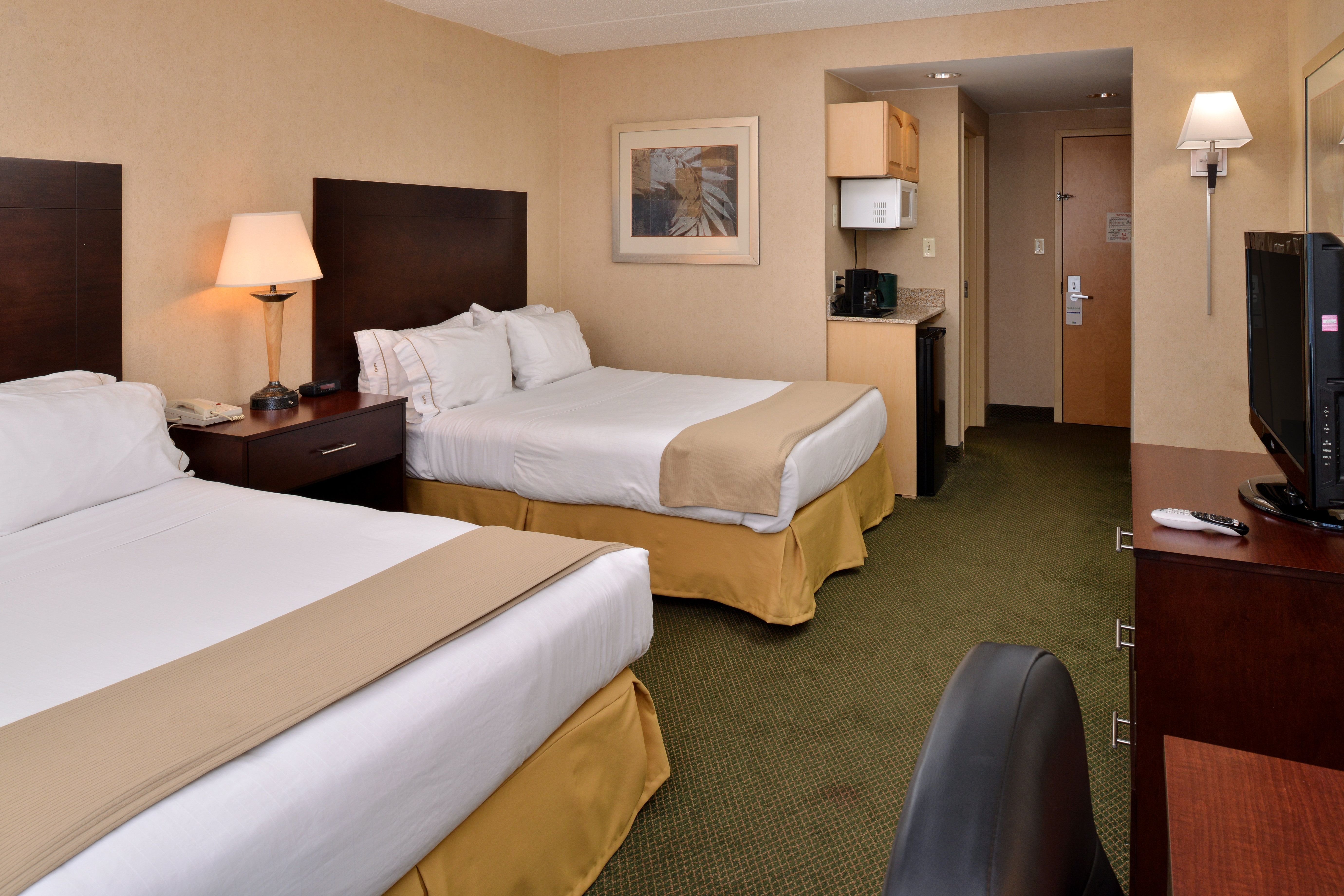 Relax in our newly appointed guest rooms with two queen beds