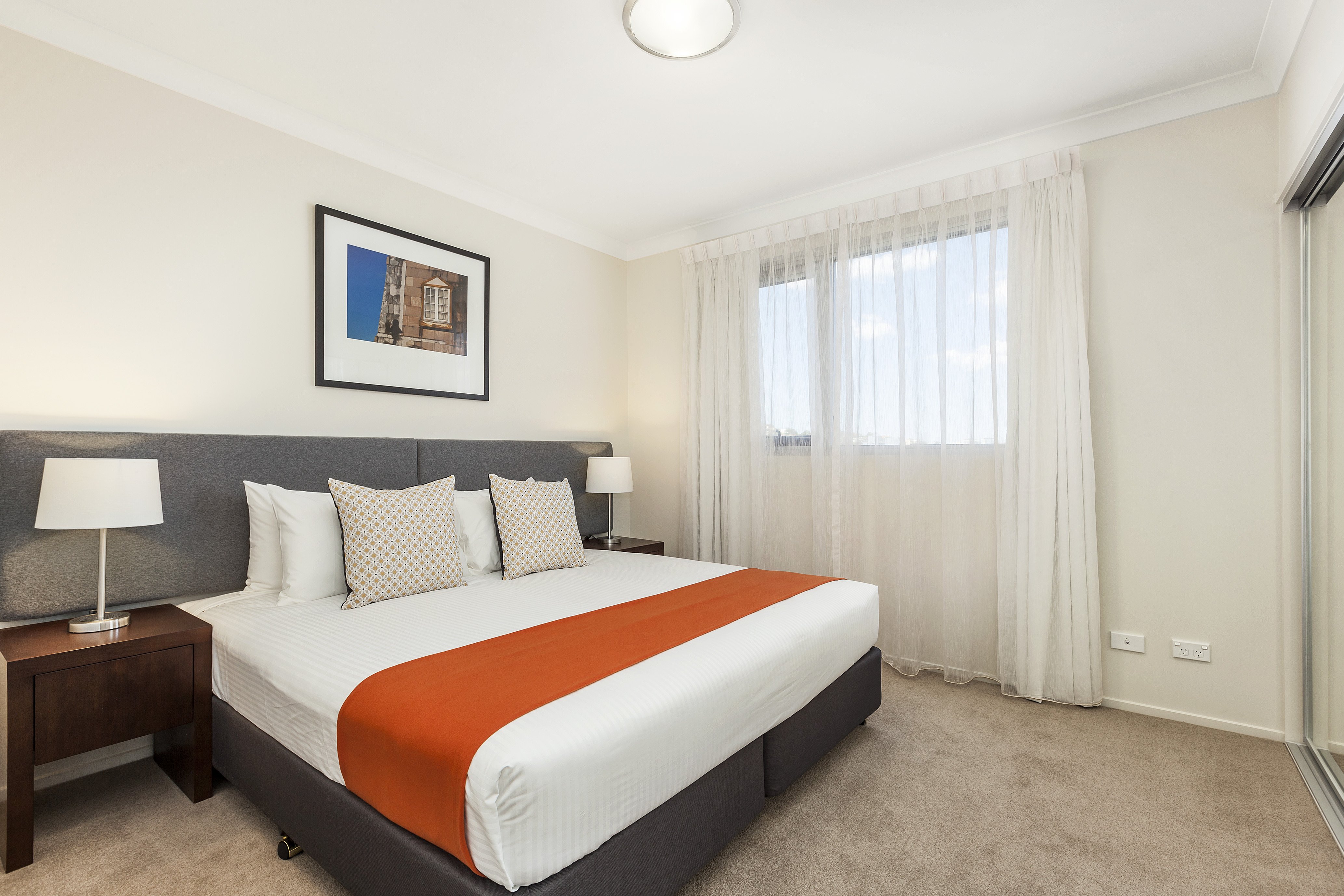 QUEST BREAKFAST CREEK-guestroom-One Bedroom Apt Bedroom.jpg
