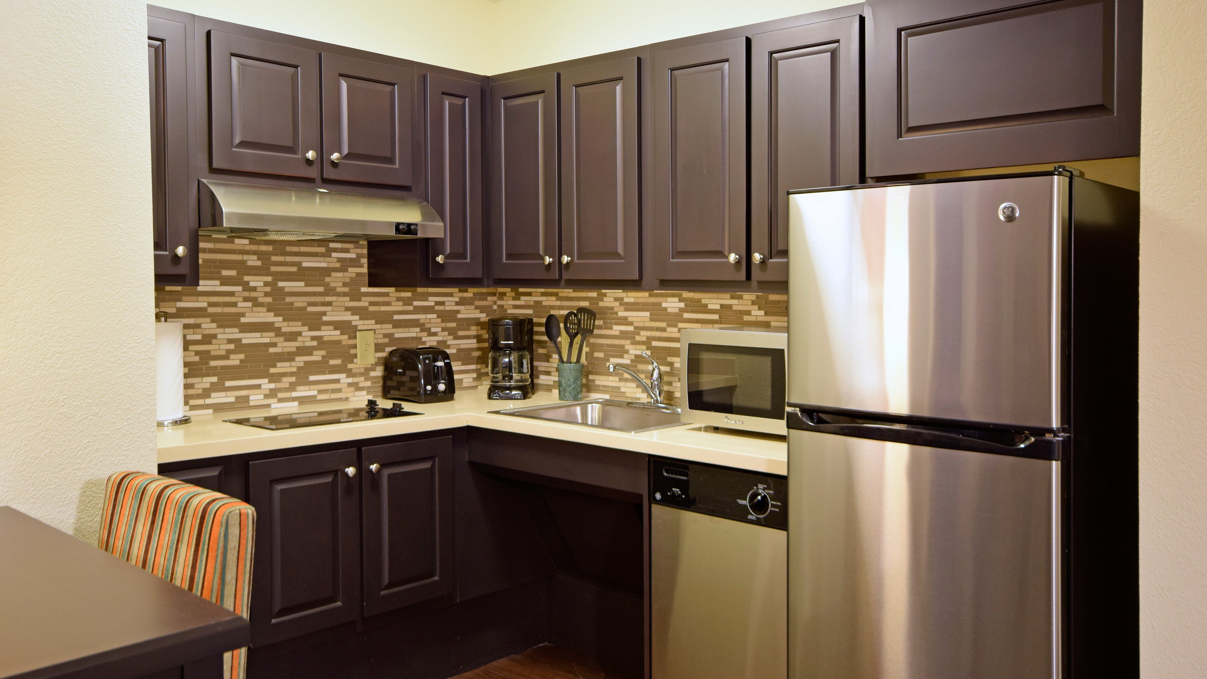 STAYBRIDGE SUITES WEST CHESTER BY I-guestroom-One bedroom with kitchen.jpg