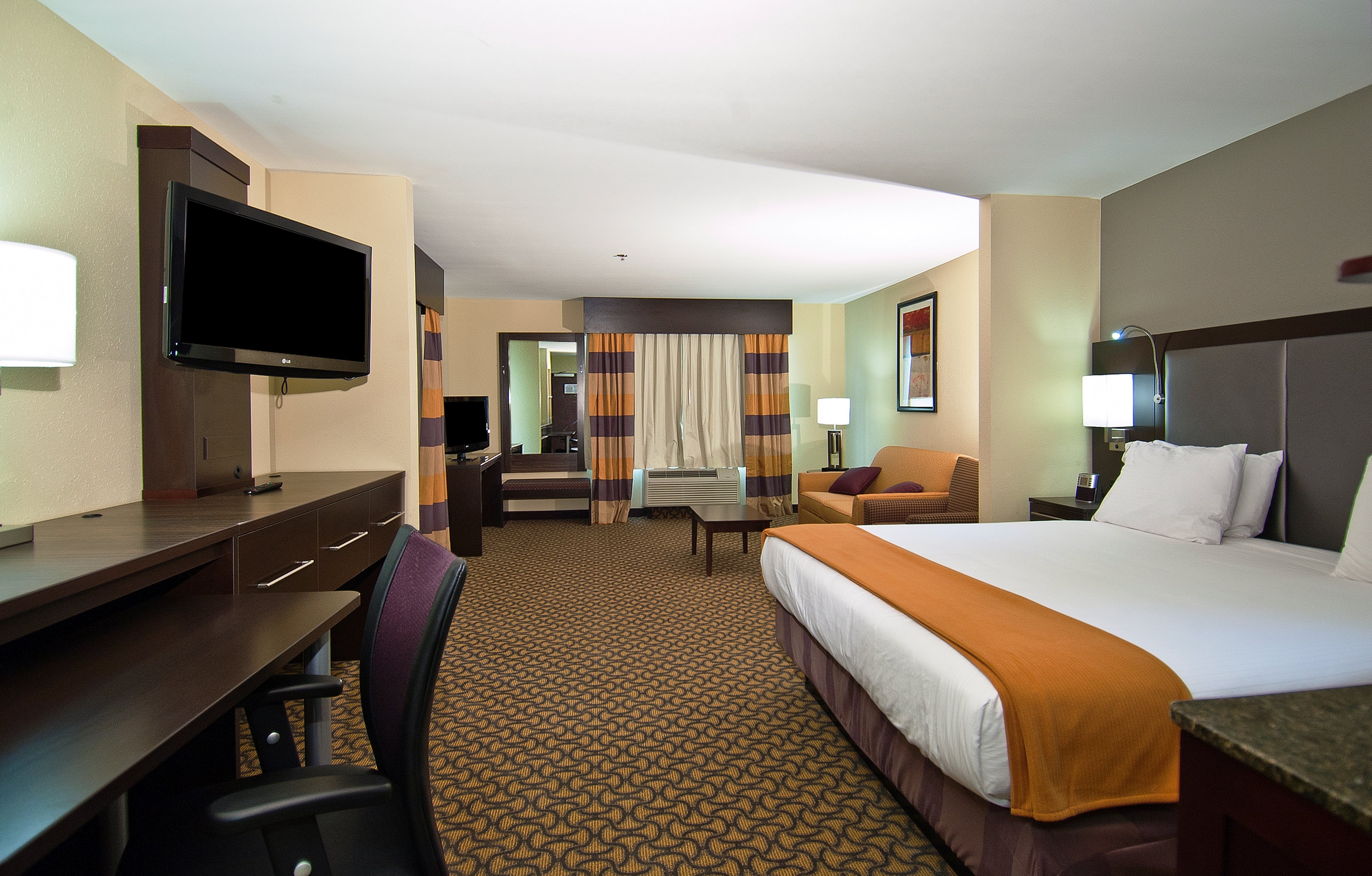 HOLIDAY INN EXP STES PEARL BY IHG-guestroom-Suite.jpg